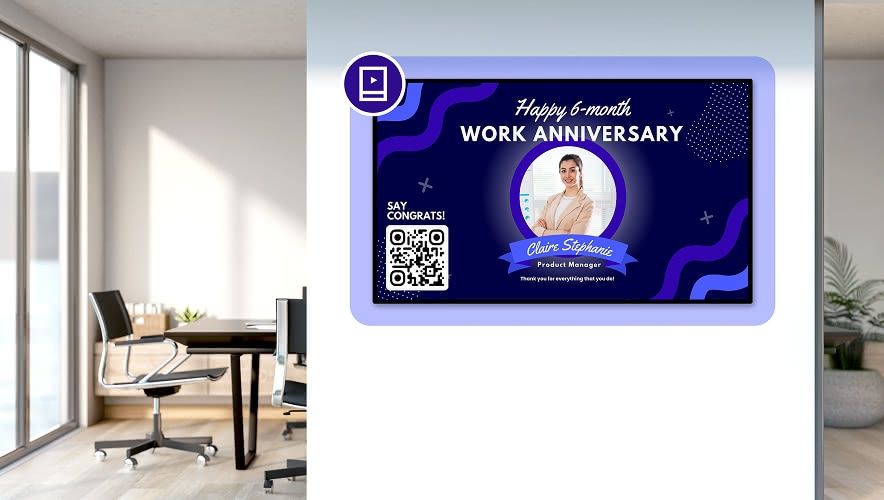 Digital signage displaying a work anniversary in a corporate office hallway