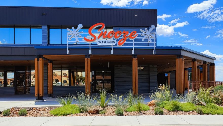 Snooze A.M. Eatery restaurant exterior with branded storefront signage