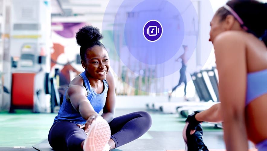 Fitness members training with Rockbot music streaming for fitness
