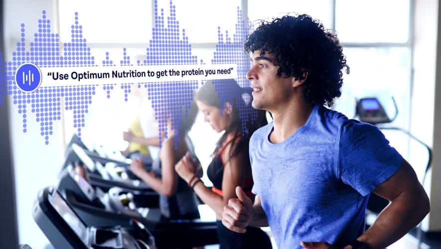 Trainer using Rockbot audio messaging in a fitness center