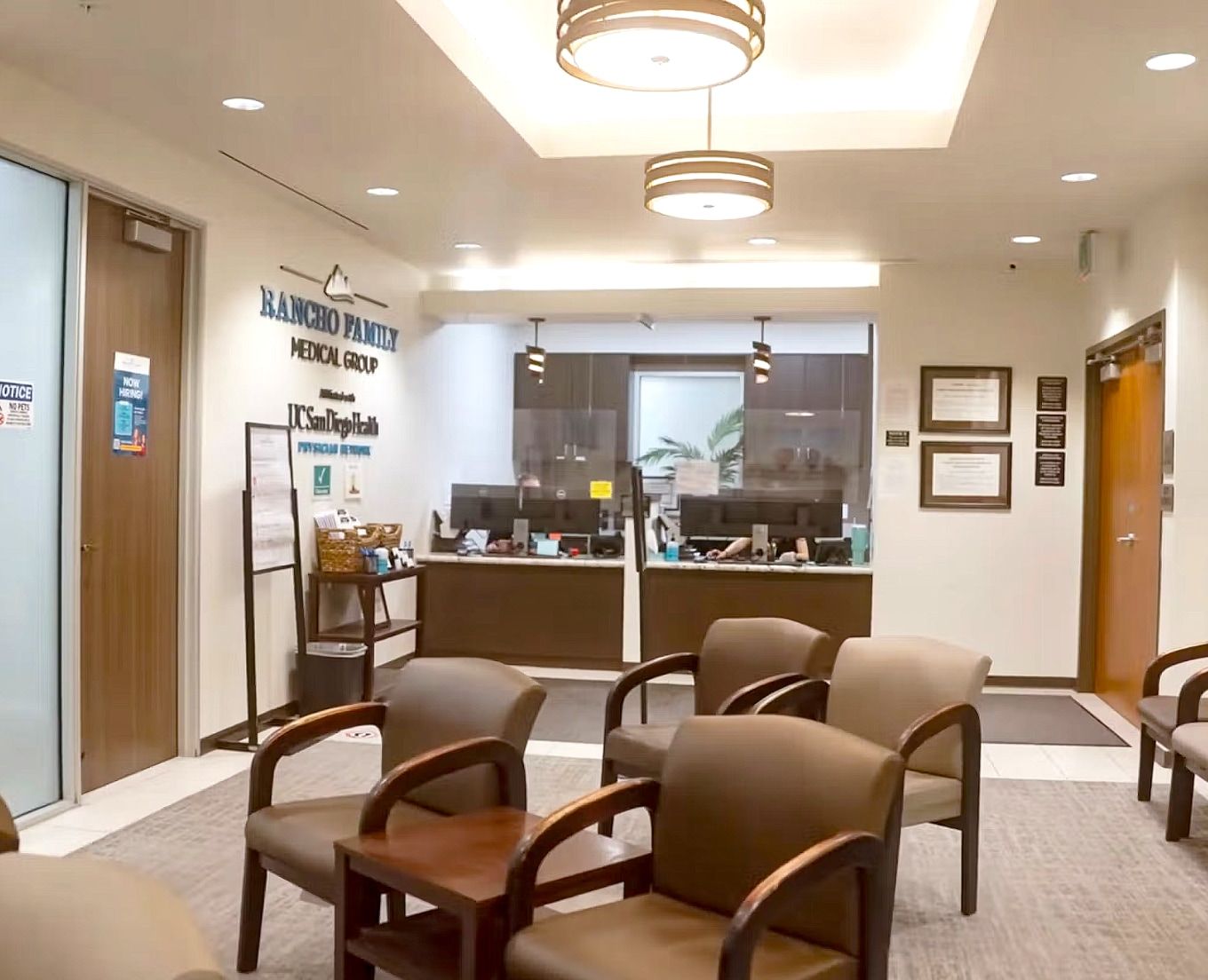 Patient waiting area at a Rancho Health MSO clinic with seating and wall-mounted TV