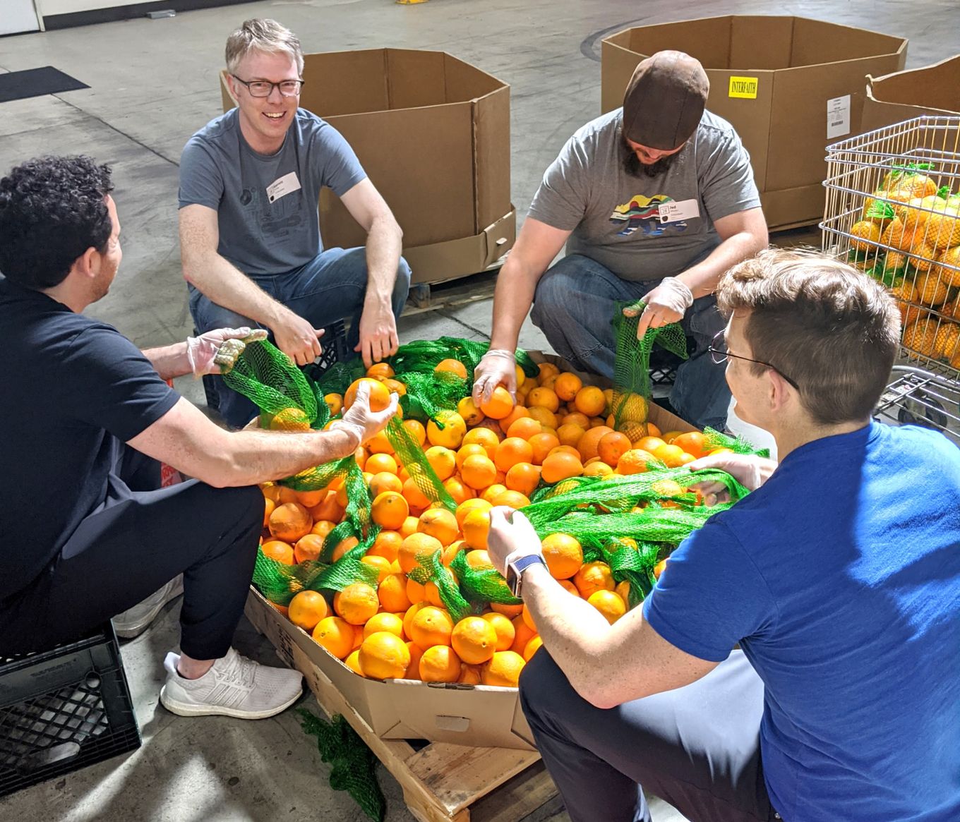 4 people from team Rockbot volunteering.