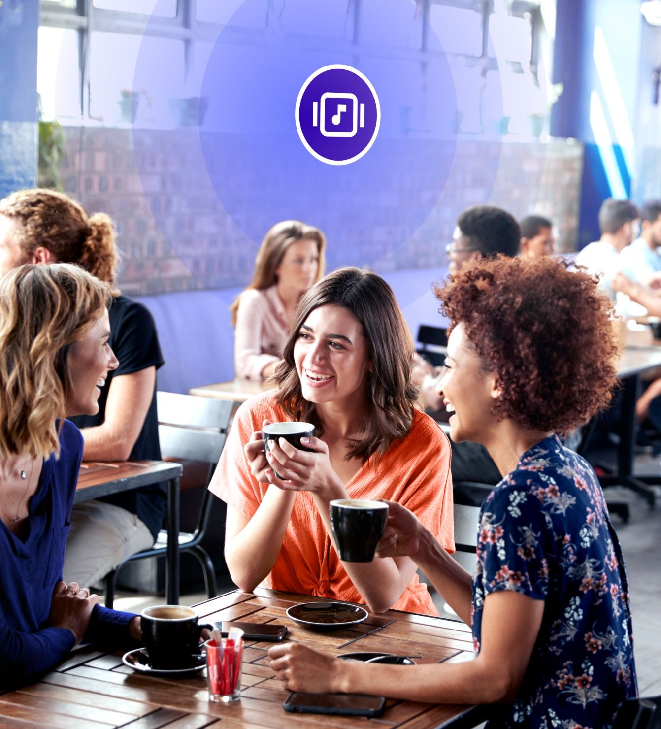 Customers chatting in a coffee shop with background music