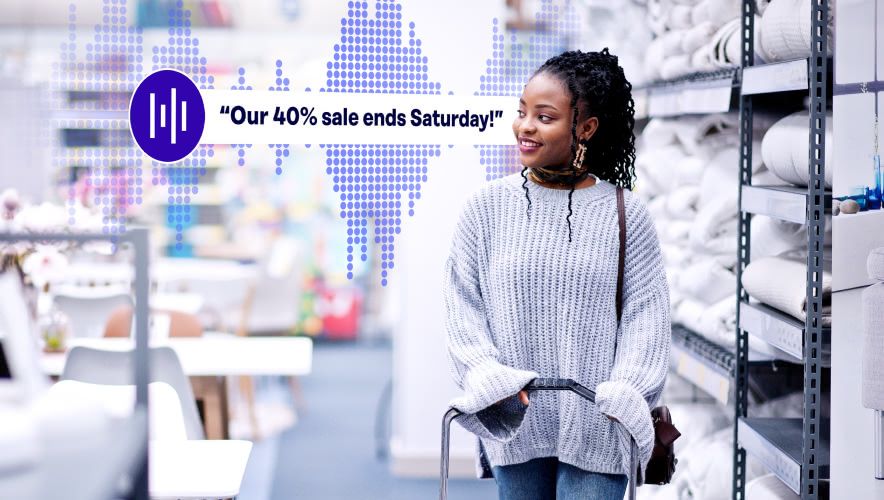 A woman shopping with a Rockbot Audio Message playing in the background