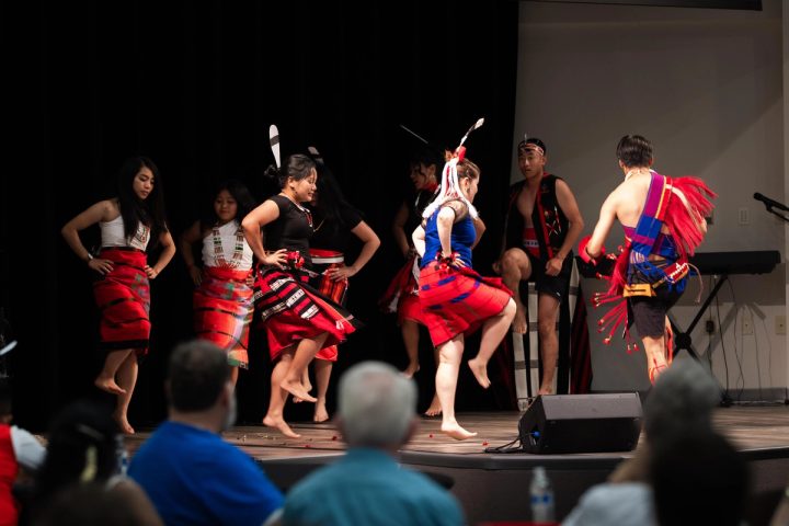Photograph of dancers performing in traditional attire at the First Naga Baptist Fundraising Cultural Event.