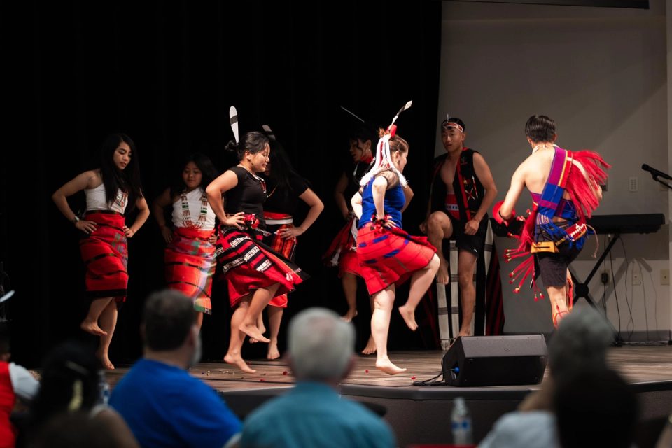 Photograph of dancers performing in traditional attire at the First Naga Baptist Fundraising Cultural Event.