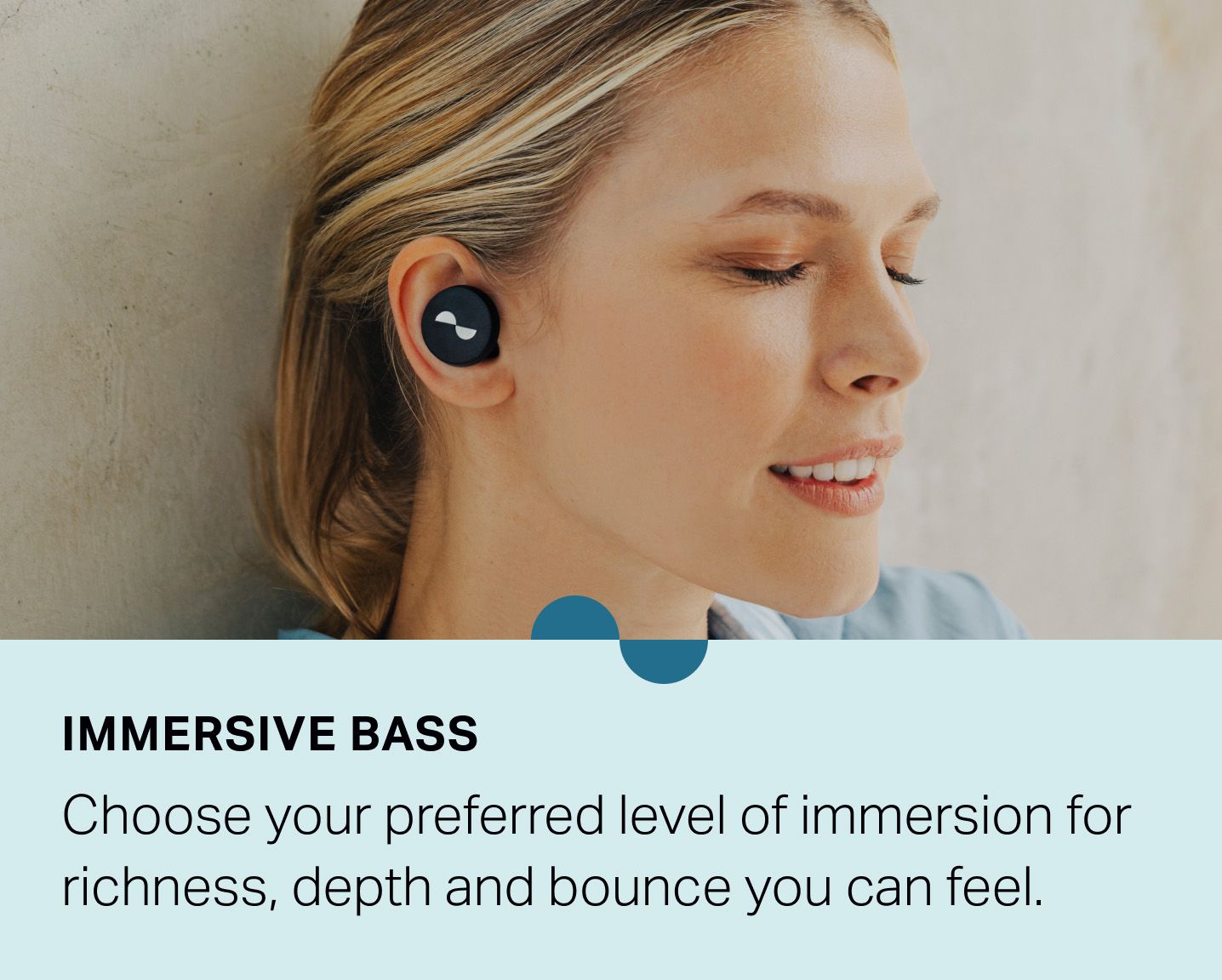 Person wearing NURATRUE earbuds in ears with eyes closed — "Immersive bass: Choose your preferred level of immersion for richness, depth and bounce you can feel."