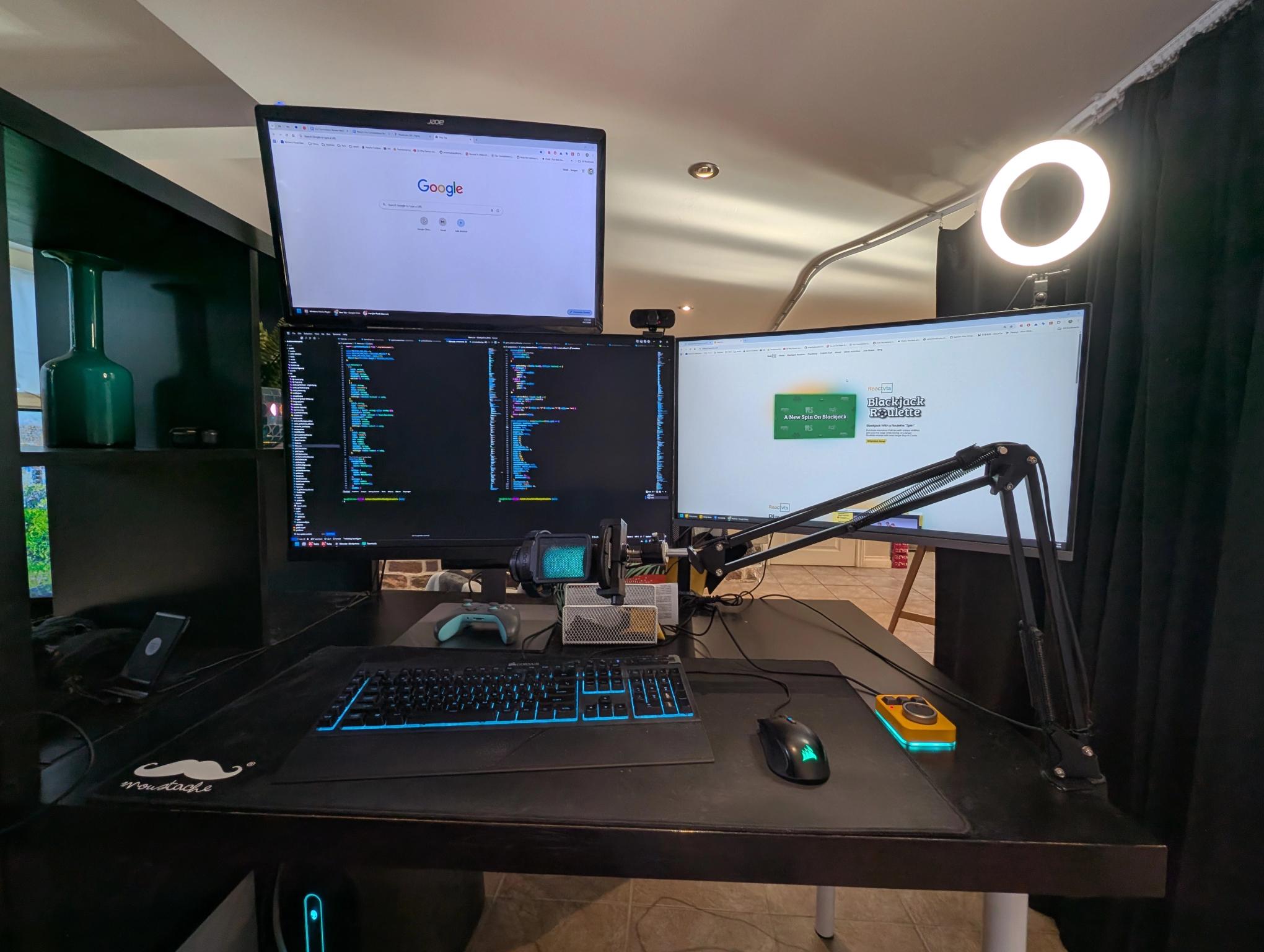 Three Computer monitors in a Sideways L shape