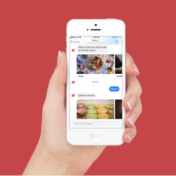 A hand holding a phone showing a food-delivery chatbot asking what the user would like to eat and drink, with photographs of dishes to pick from