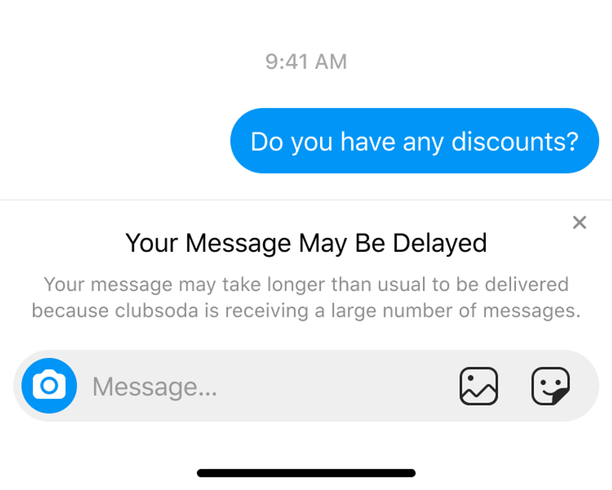 An Instagram conversation showing the heavy-load banner “Your message may be delayed”