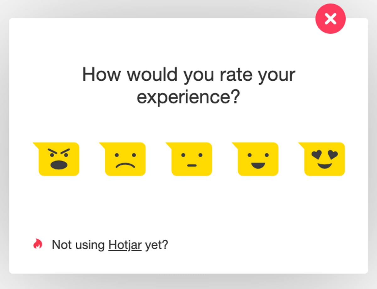 Hotjar feedback pop-up asking “How would you rate your experience?” over five yellow emoji faces running from angry to delighted