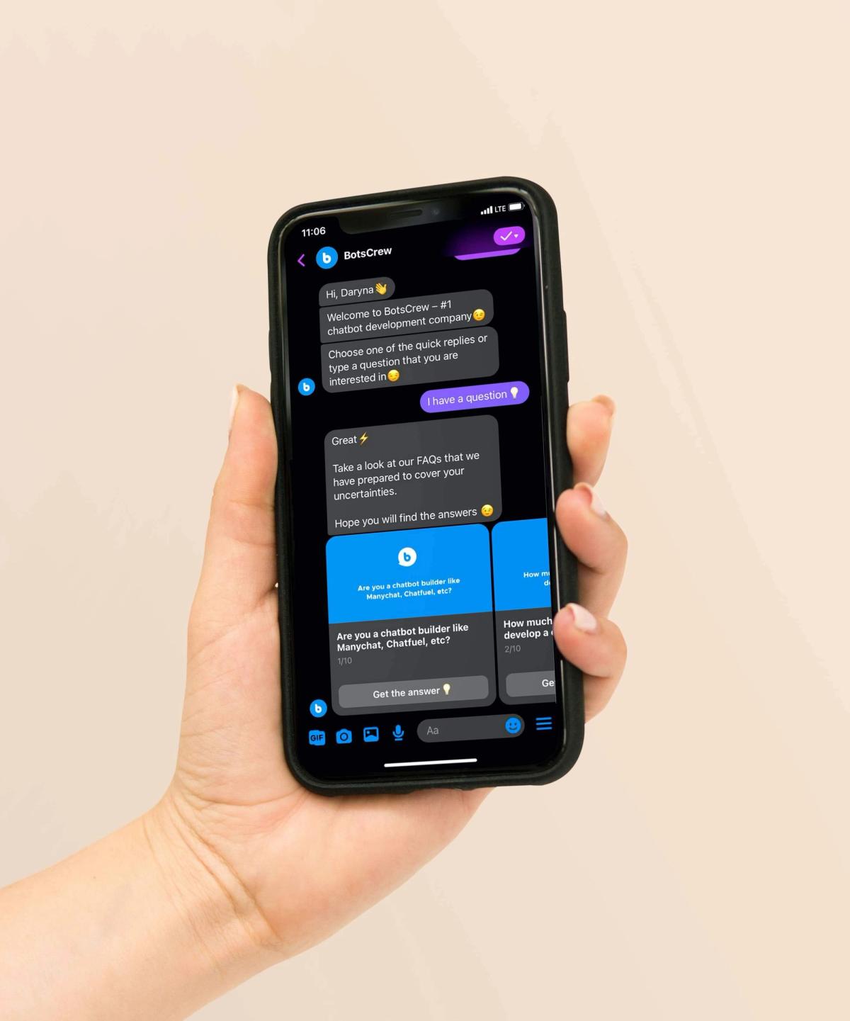 A hand holding a phone showing the BotsCrew bot in Facebook Messenger: it greets "Hi, Daryna", introduces BotsCrew as a chatbot development company, offers quick replies, and after "I have a question" shows a carousel of FAQ cards such as "Are you a chatbot builder like Manychat, Chatfuel, etc?" each with a "Get the answer" button