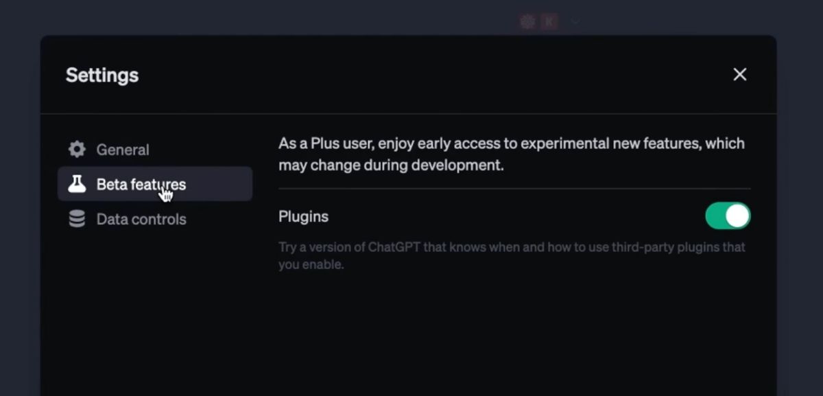 The ChatGPT Settings dialog with the “Beta features” tab selected, showing a Plugins toggle switched on above the note “Try a version of ChatGPT that knows when and how to use third-party plugins that you enable.”