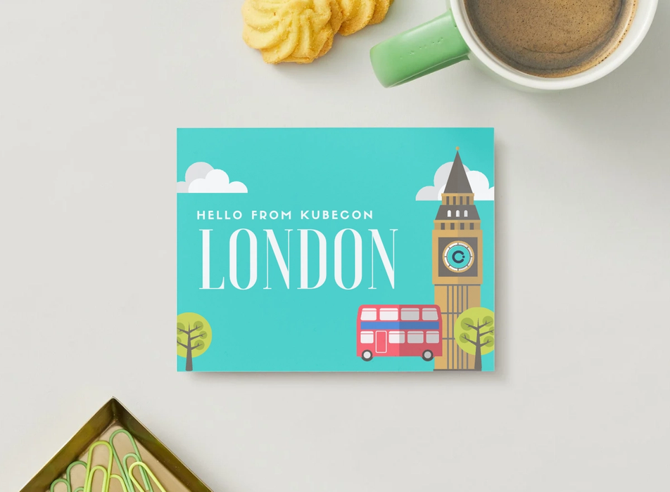 A overhead picture of a custom postcard from KubeCon London.