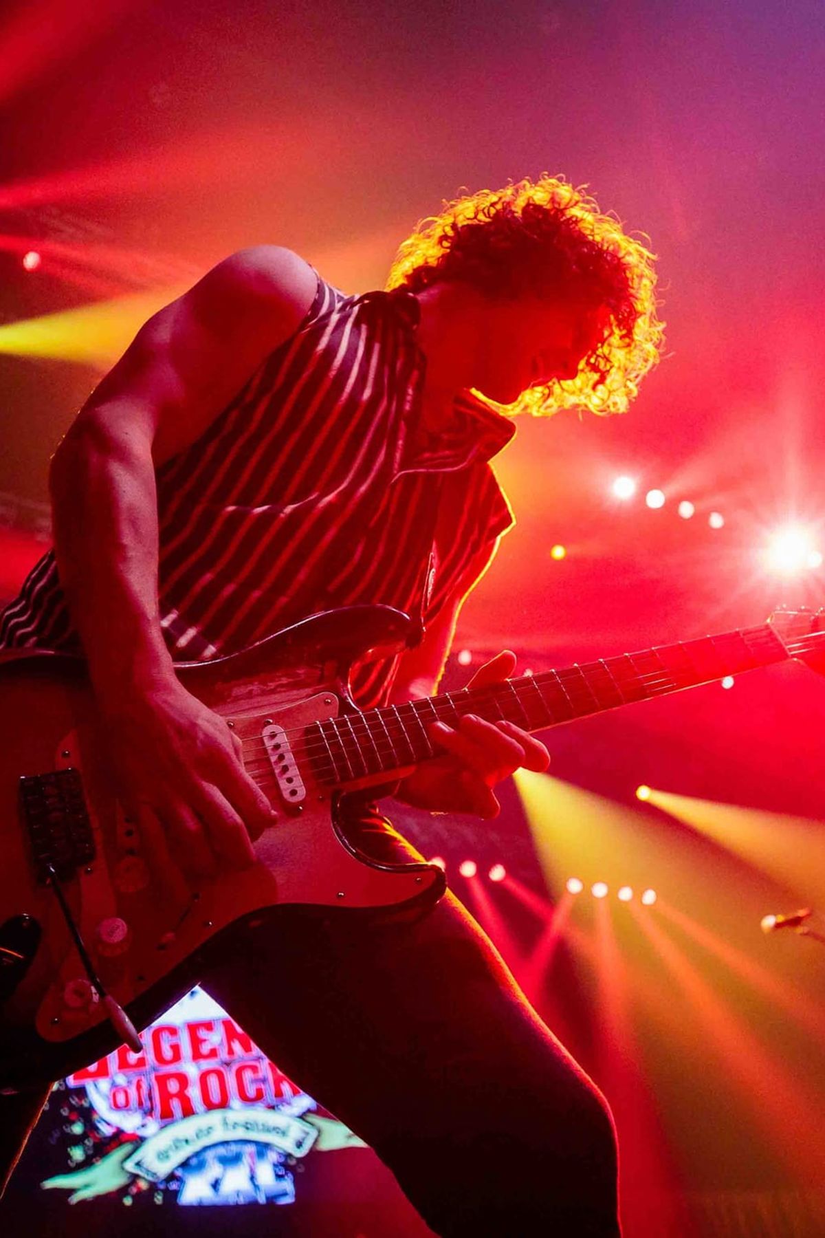 Foto van een gitarist tijdens een live-optreden. Fotografie door Bold Productions, contentspecialist voor Events & Artiesten.