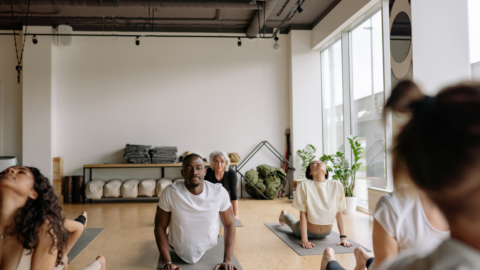 Employee Wellness Programs That Work: Why In-Home Training Beats the Gym Stipend