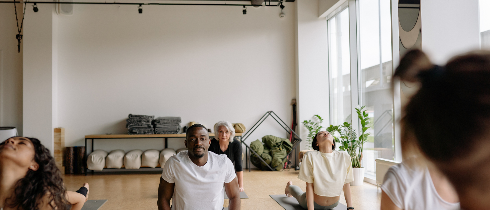 Employee Wellness Programs That Work: Why In-Home Training Beats the Gym Stipend
