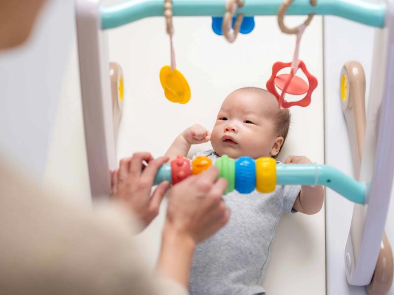 Playing with your 3-6 month old: supporting grasps, giggles, and rolling