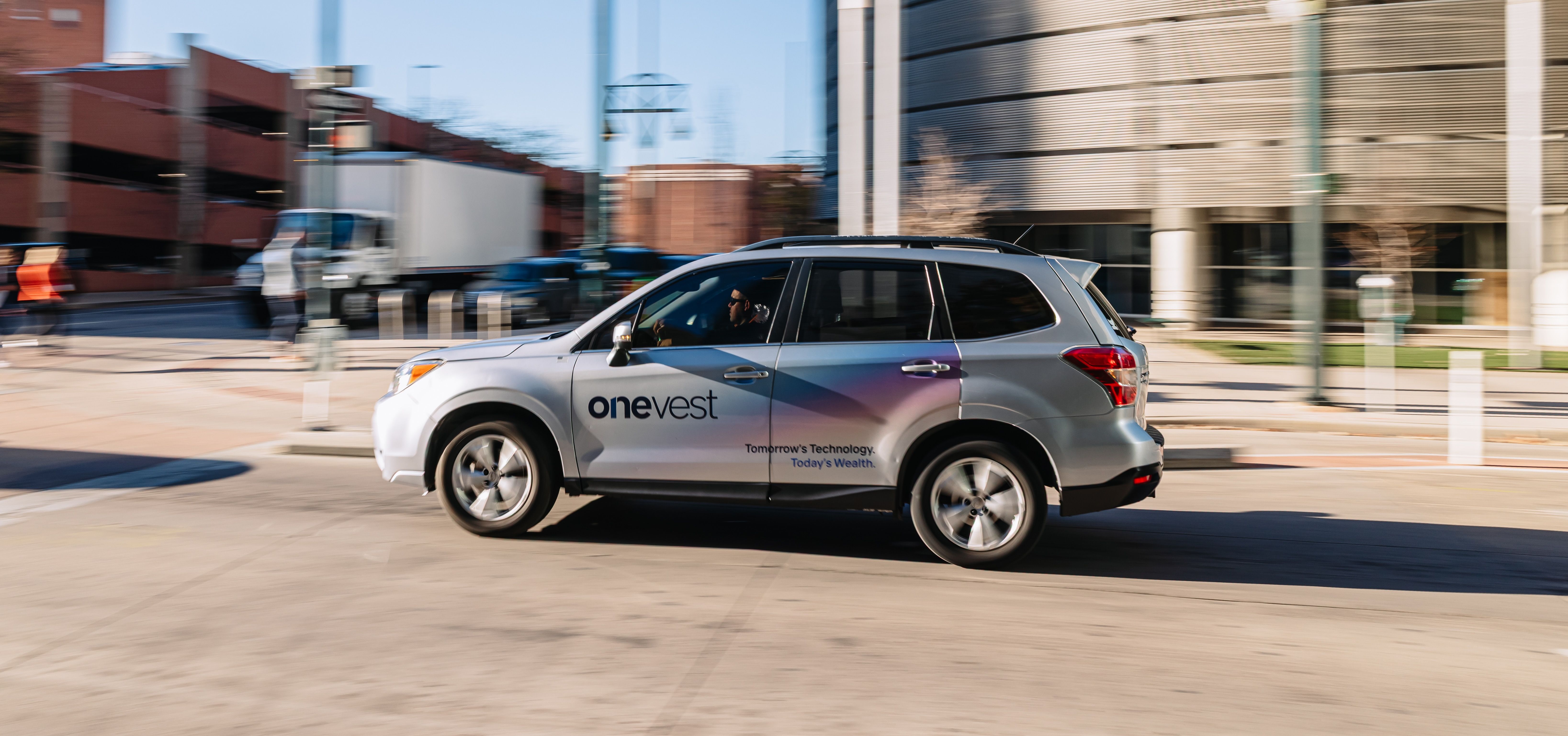 OneVest wrapped car OOH campaign in Denver via GOOD TRAFFIC