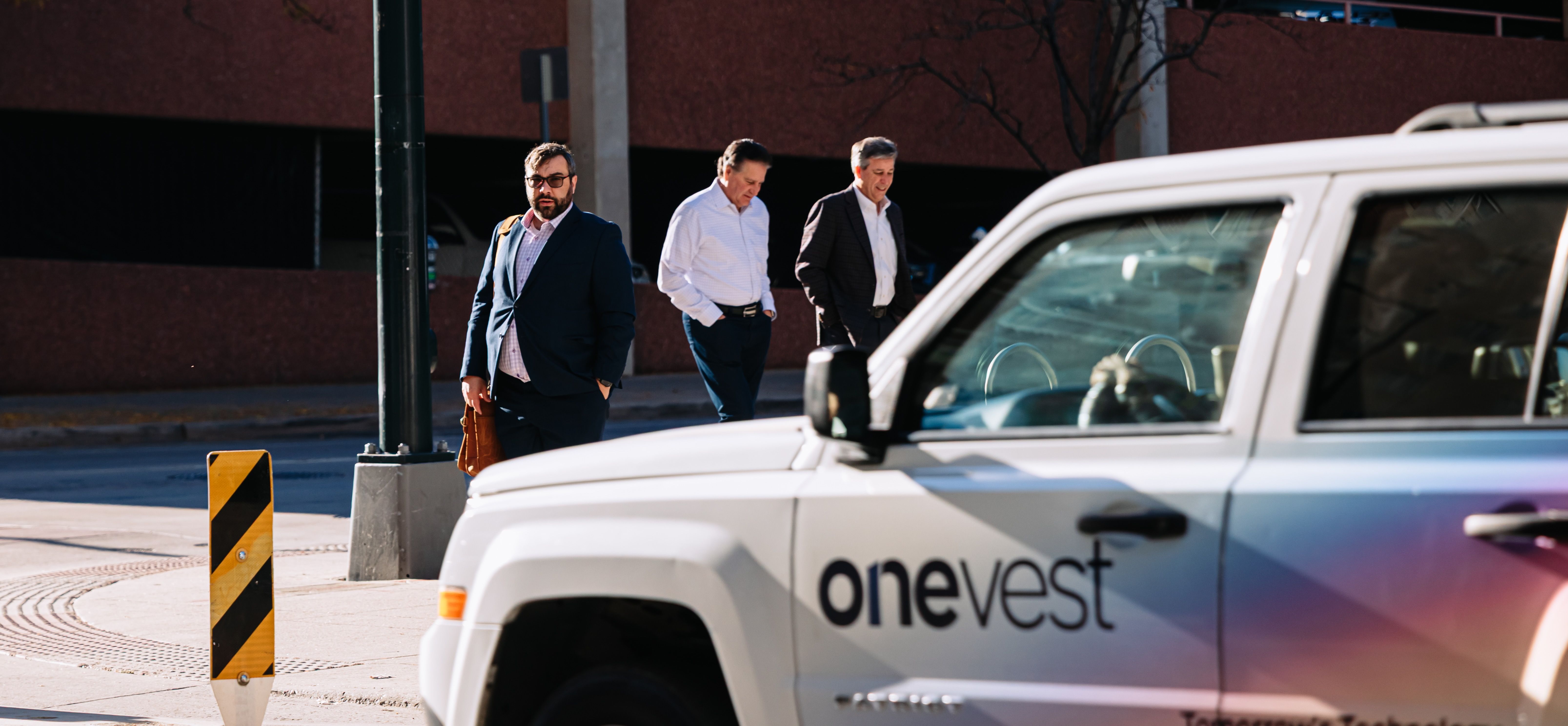 OneVest wrapped car OOH campaign in Denver via GOOD TRAFFIC