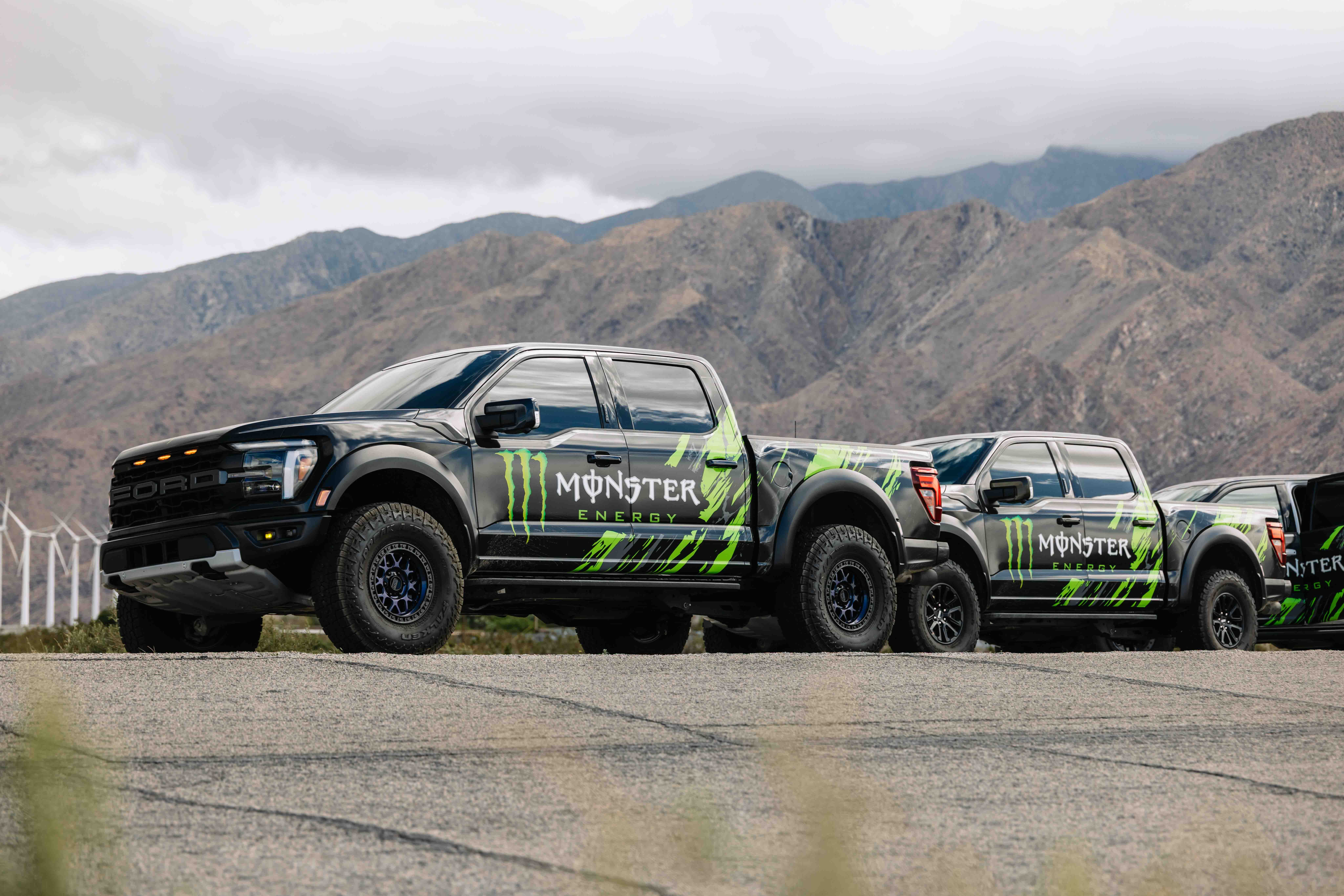 Monster Energy wrapped rideshare trucks 
