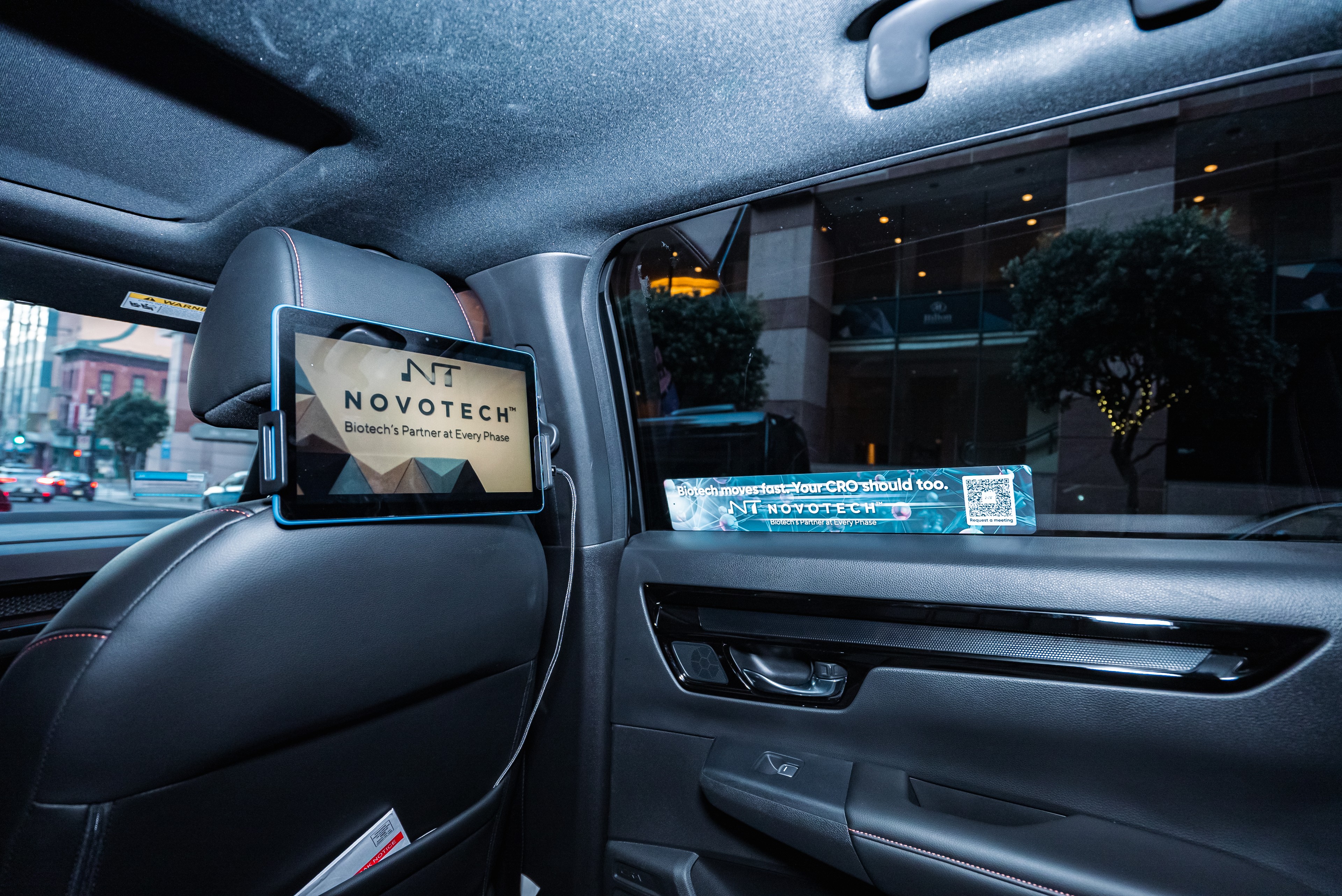 interior advertising tablet and window decal