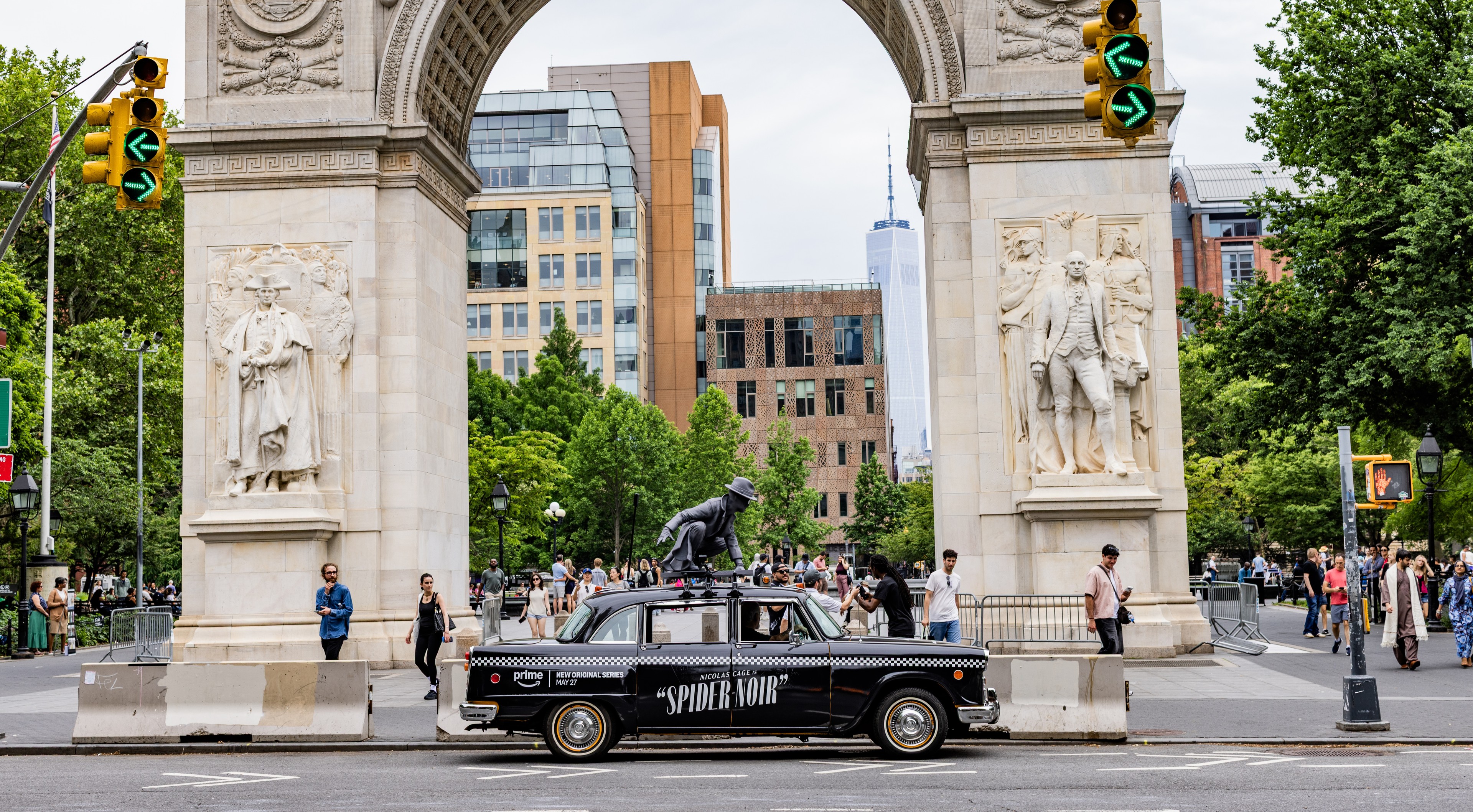 Wrapped specialty vehicle (vintage taxi) with prime video spidernoir 3D topper driving through NYC