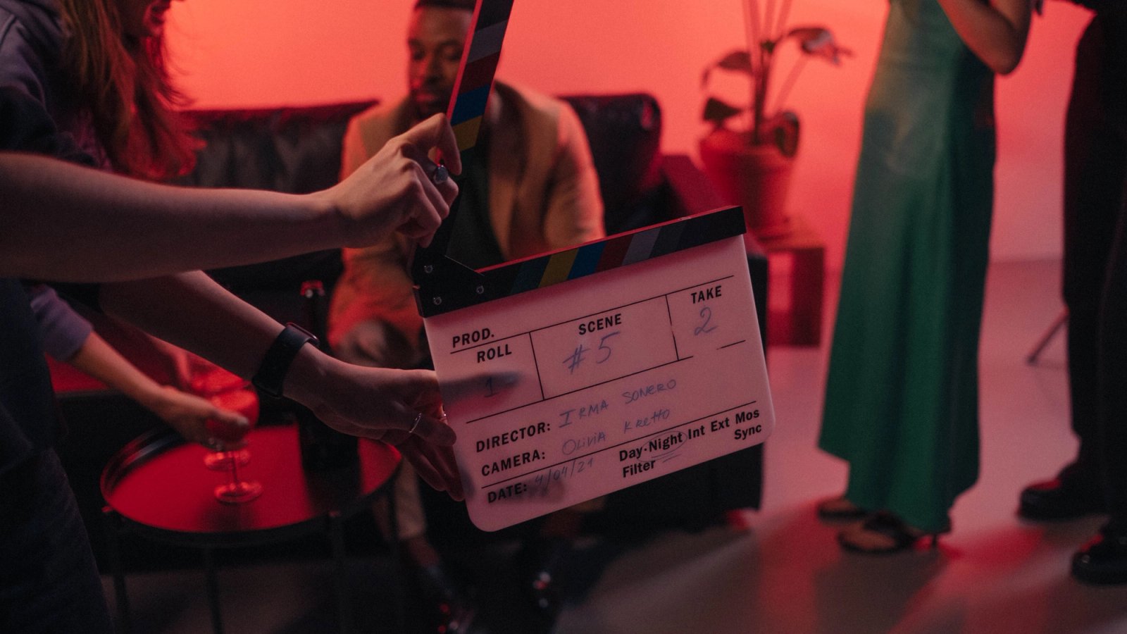 A Filmmaker Holding a Clapper-Board