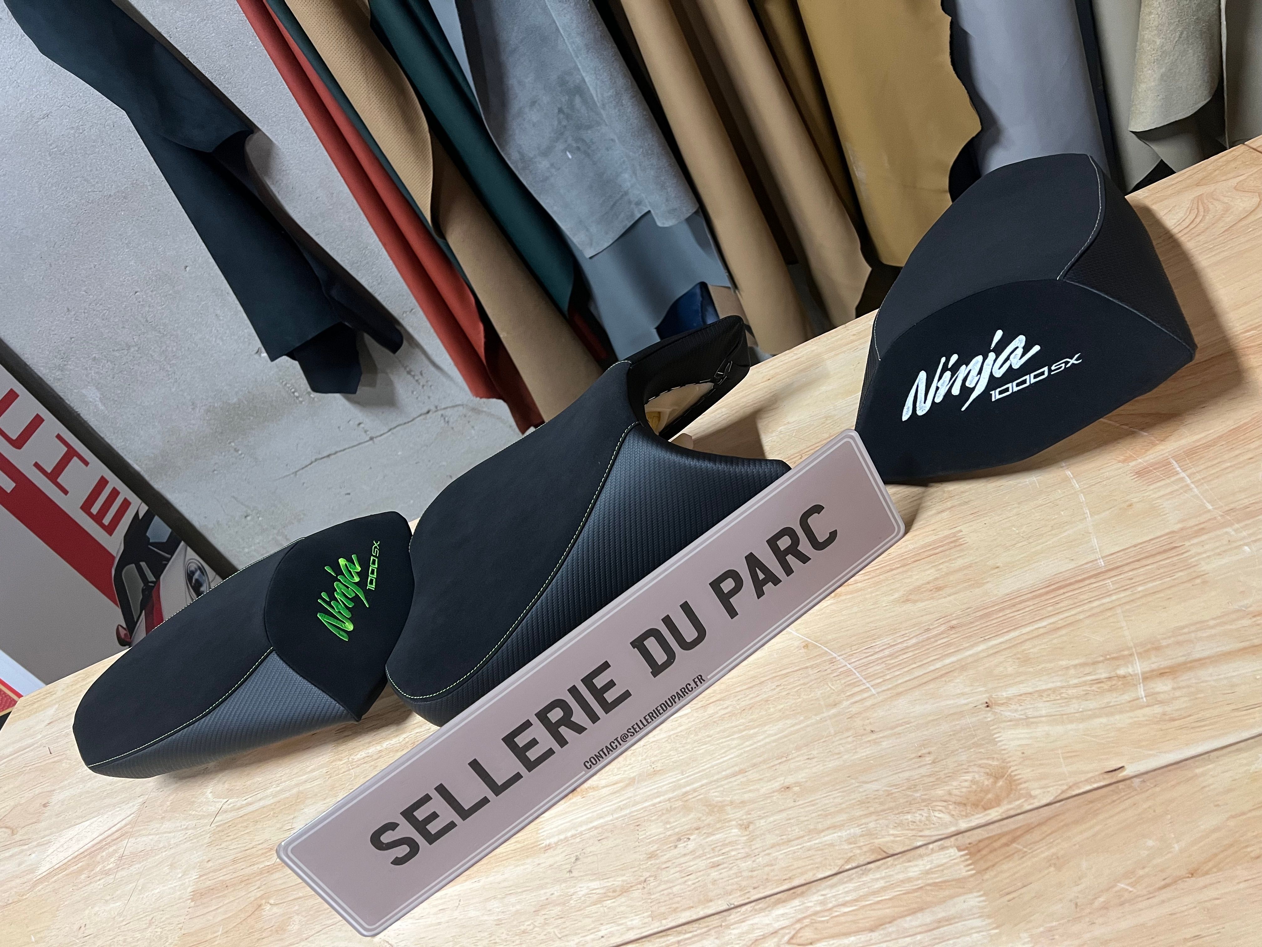 Custom motorcycle seat in an upholstery workshop