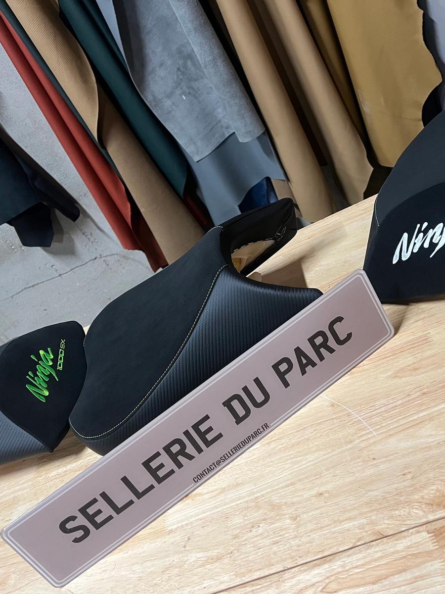 Custom motorcycle seat in an upholstery workshop