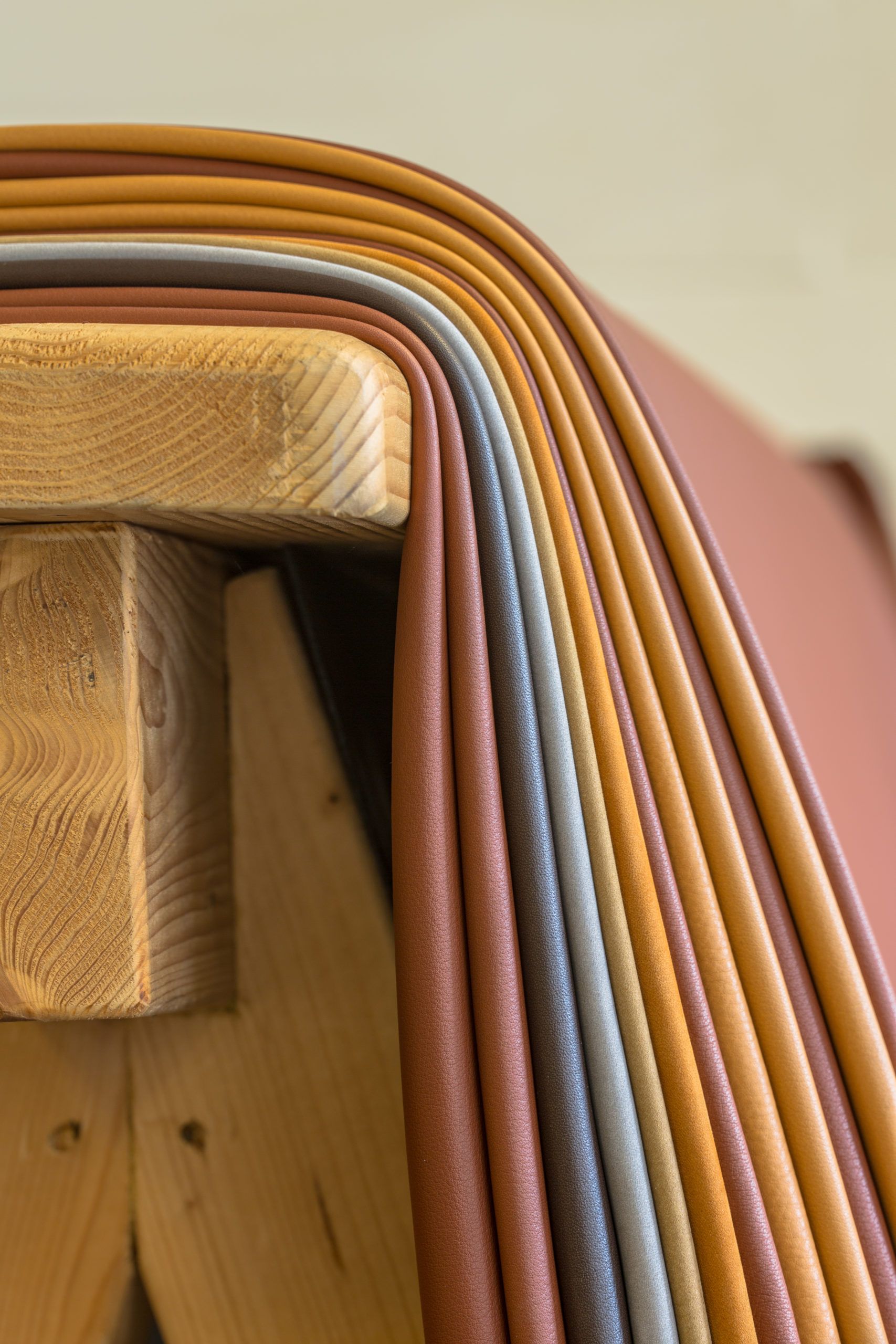 Leather pieces in different colours in an upholstery workshop