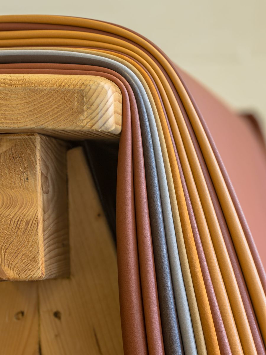 Leather pieces in different colours in an upholstery workshop