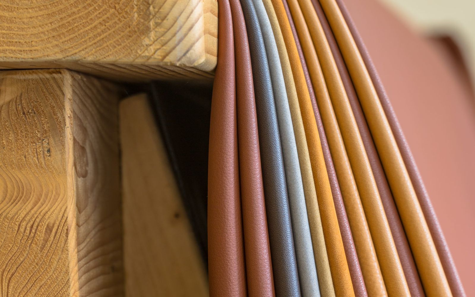 Leather pieces in different colours in an upholstery workshop