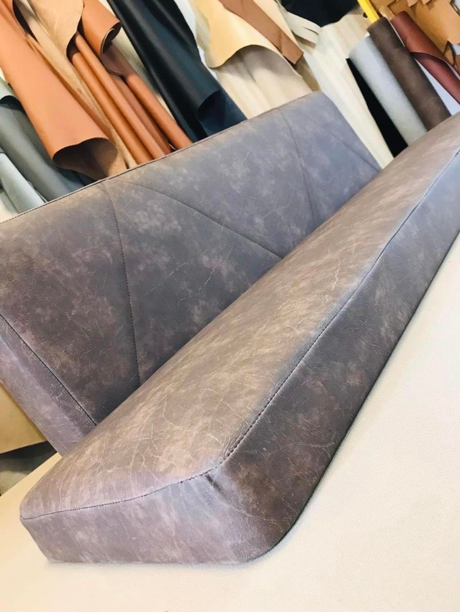 Restored leather armchair in the workshop