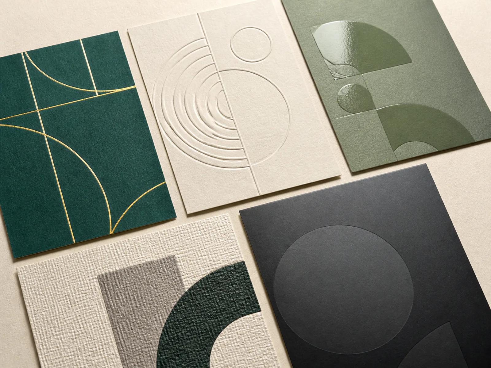Premium paper finish samples showing foil embossing spot gloss texture and matte surfaces