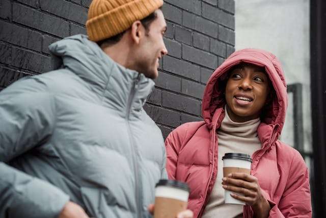 Couple with takeaway coffee - best first date idea