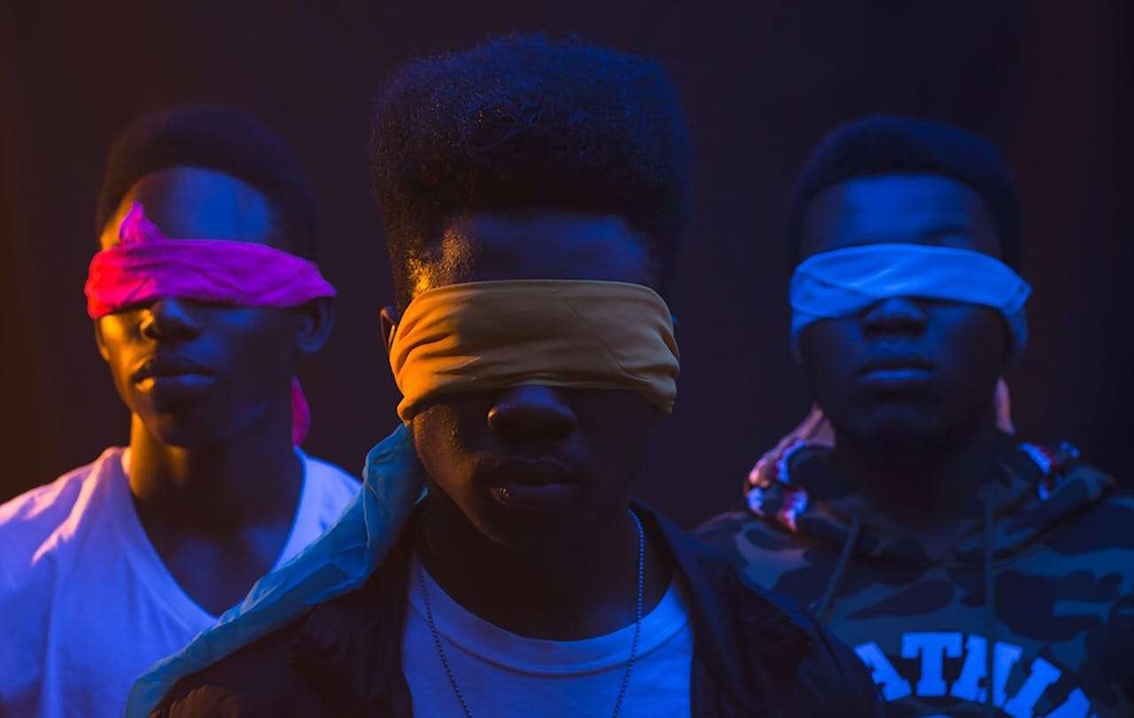 three black skin introverts blindfold