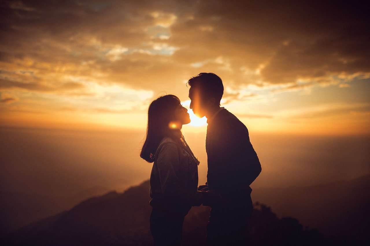 sunset, couple, try to kiss