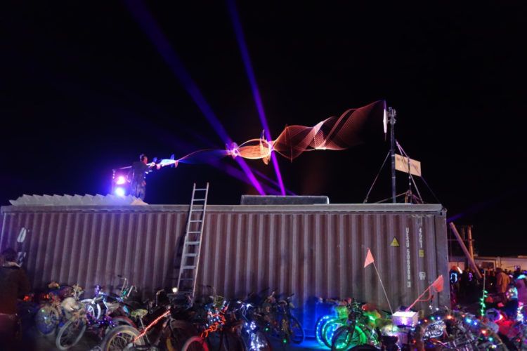 Burning Man Illuminated Spinning Strings synced to music.
