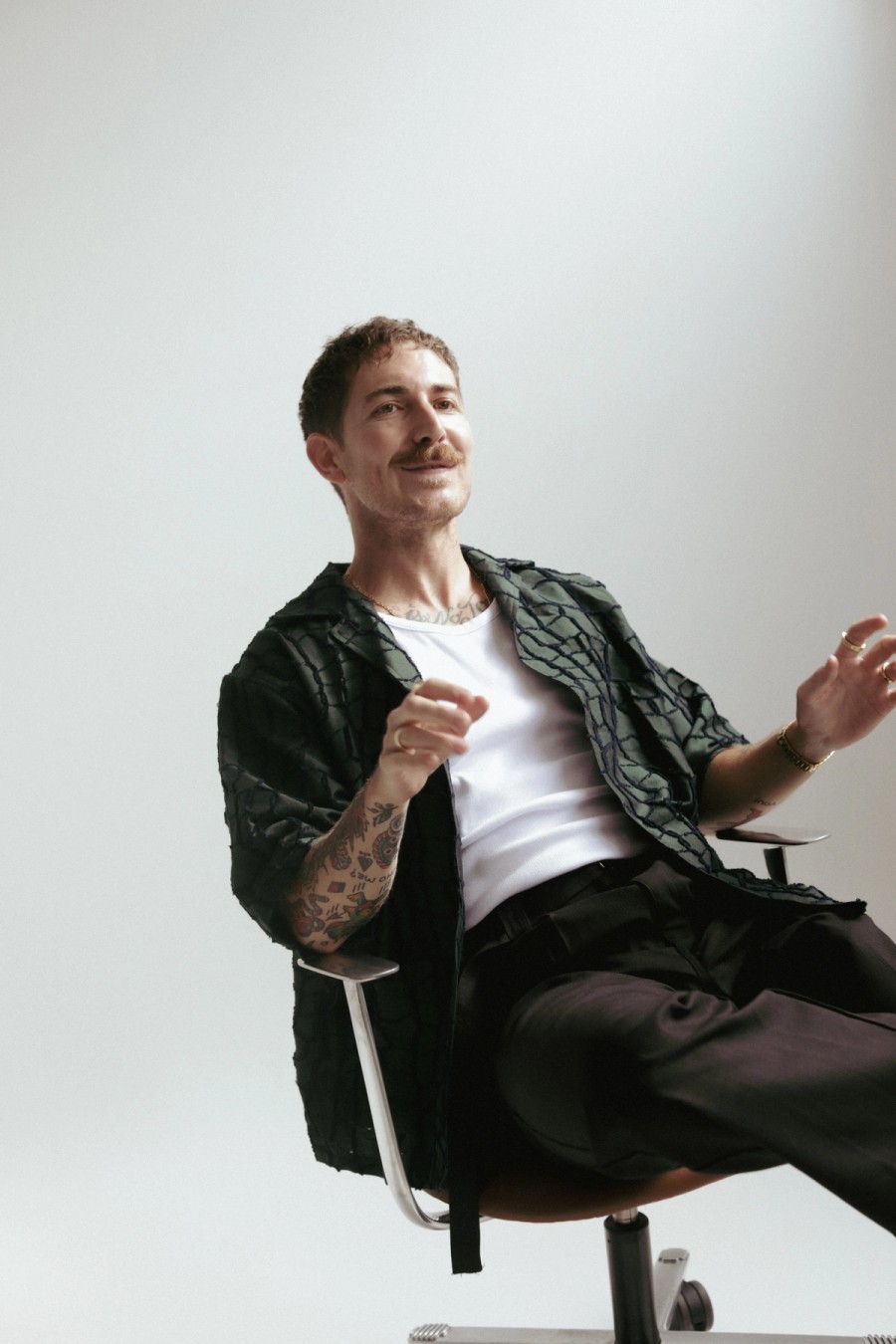 Mitchell Jones, sitting in a chair