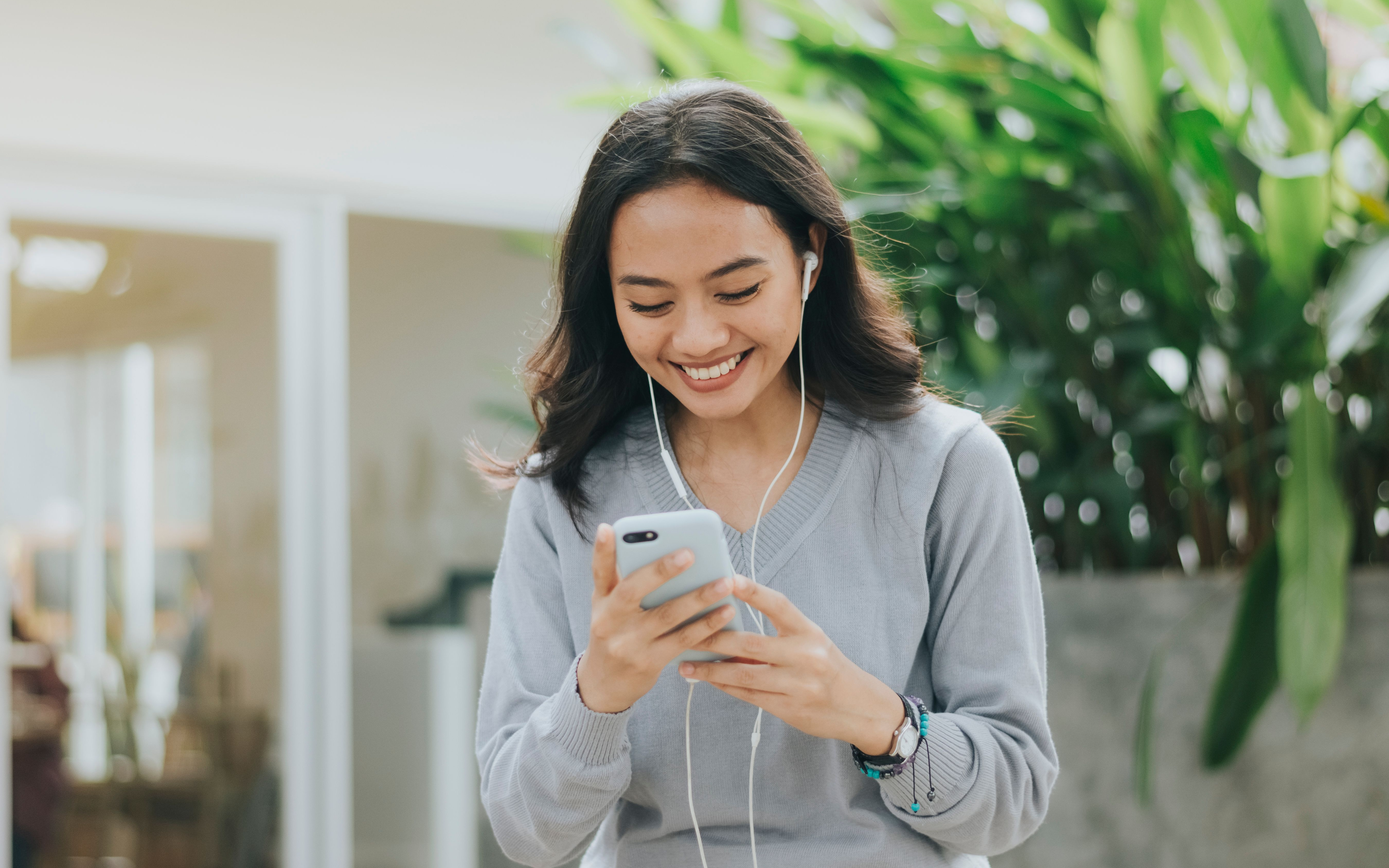 Smiling woman working at a desk