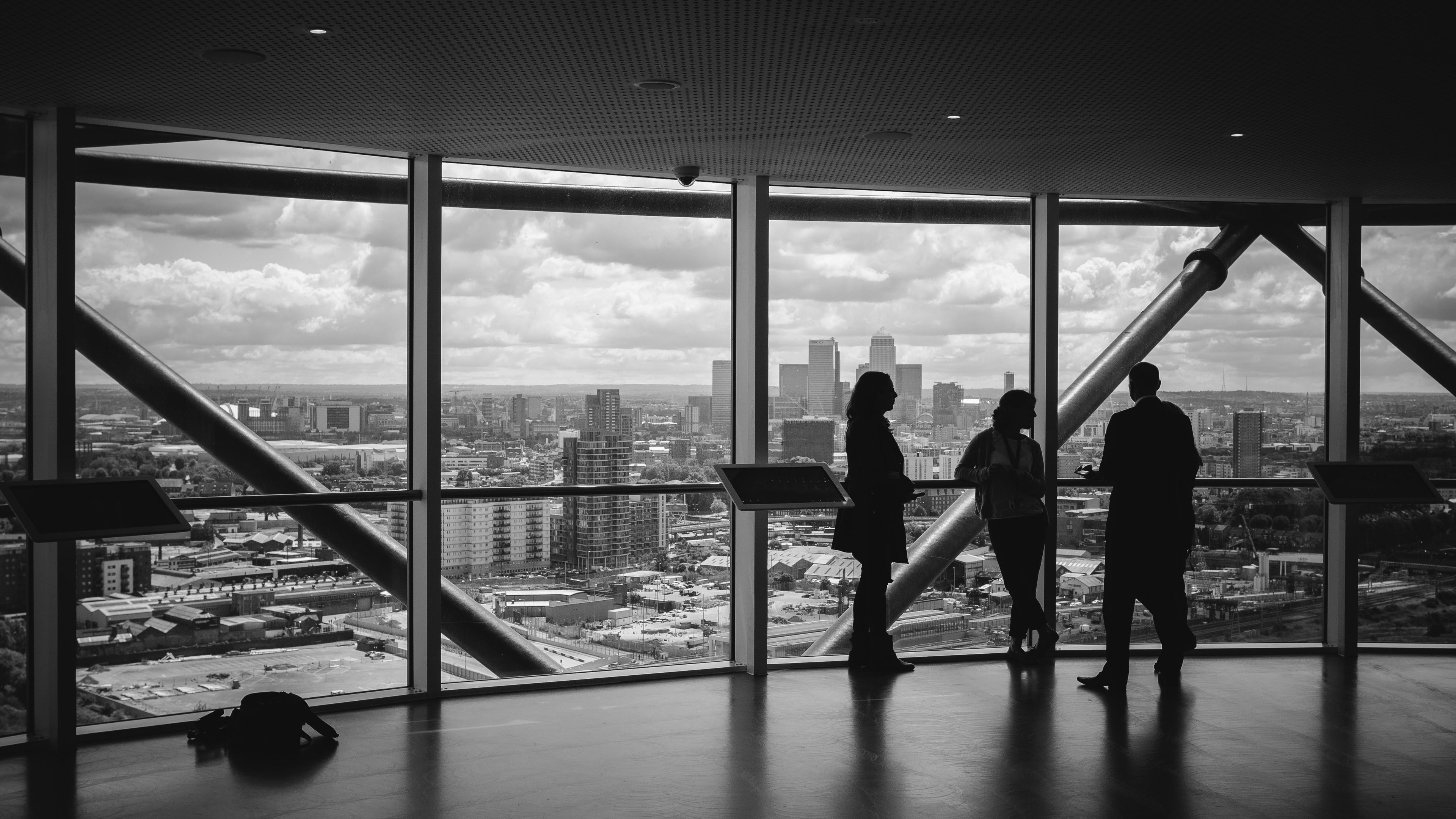 black and white generic scene of professionals in an office building