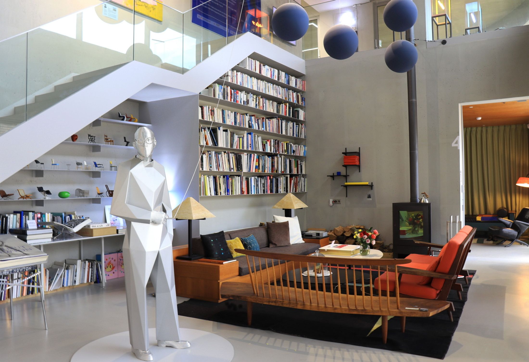 A bright room with a white staircase and glass bannister with a book shelf and lounge below and a white sculpture of a man​​​​‌﻿‍﻿​‍​‍‌‍﻿﻿‌﻿​‍‌‍‍‌‌‍‌﻿‌‍‍‌‌‍﻿‍​‍​‍​﻿‍‍​‍​‍‌﻿​﻿‌‍​‌‌‍﻿‍‌‍‍‌‌﻿‌​‌﻿‍‌​‍﻿‍‌‍‍‌‌‍﻿﻿​‍​‍​‍﻿​​‍​‍‌‍‍​‌﻿​‍‌‍‌‌‌‍‌‍​‍​‍​﻿‍‍​‍​‍‌‍‍​‌﻿‌​‌﻿‌​‌﻿​​​﻿‍‍​‍﻿﻿​‍﻿﻿‌‍﻿​‌‍﻿﻿‌‍​﻿‌‍​‌‌‍﻿​‌‍‍​‌‍﻿﻿‌﻿​﻿‌﻿‌​​﻿‍‍​﻿​﻿​﻿​﻿​﻿​﻿​﻿​﻿​‍﻿﻿‌‍‍‌‌‍﻿‍‌﻿‌​‌‍‌‌‌‍﻿‍‌﻿‌​​‍﻿﻿‌‍‌‌‌‍‌​‌‍‍‌‌﻿‌​​‍﻿﻿‌‍﻿‌‌‍﻿﻿‌‍‌​‌‍‌‌​﻿﻿‌‌﻿​​‌﻿​‍‌‍‌‌‌﻿​﻿‌‍‌‌‌‍﻿‍‌﻿‌​‌‍​‌‌﻿‌​‌‍‍‌‌‍﻿﻿‌‍﻿‍​﻿‍﻿‌‍‍‌‌‍‌​​﻿﻿‌​﻿​‌​﻿​‍​﻿‌​​﻿‌​​﻿‍‌​﻿‌﻿‌‍​﻿​﻿‌‌​‍﻿‌‌‍‌‌‌‍‌‌​﻿‌​​﻿​​​‍﻿‌​﻿‌​​﻿​﻿‌‍​‍‌‍‌​​‍﻿‌‌‍​‌‌‍‌​‌‍‌‌‌‍‌‌​‍﻿‌‌‍​﻿​﻿‌﻿‌‍‌‌‌‍‌​​﻿​‌​﻿‍​​﻿​​‌‍​‌‌‍‌‌‌‍‌‍‌‍​‌‌‍‌​​﻿‍﻿‌﻿‌​‌﻿‍‌‌﻿​​‌‍‌‌​﻿﻿‌‌﻿​​‌‍﻿﻿‌﻿​﻿‌﻿‌​​﻿‍﻿‌﻿​​‌‍​‌‌﻿‌​‌‍‍​​﻿﻿‌‌‍​‍‌‍﻿﻿‌‍‌​‌﻿‍‌​‍‌‌​﻿‌‌‌​​‍‌‌﻿﻿‌‍‍﻿‌‍‌‌‌﻿‍‌​‍‌‌​﻿​﻿‌​‌​​‍‌‌​﻿​﻿‌​‌​​‍‌‌​﻿​‍​﻿​‍​﻿​​​﻿​‌​﻿​﻿​﻿‍​‌‍‌‌‌‍‌‌​﻿‍‌‌‍​﻿‌‍​‌​﻿‍​‌‍​‍​﻿​‌​‍‌‌​﻿​‍​﻿​‍​‍‌‌​﻿‌‌‌​‌​​‍﻿‍‌‍​‌‌‍﻿​‌﻿‌​​﻿﻿﻿‌‍​‍‌‍​‌‌﻿​﻿‌‍‌‌‌‌‌‌‌﻿​‍‌‍﻿​​﻿﻿‌‌‍‍​‌﻿‌​‌﻿‌​‌﻿​​​‍‌‌​﻿​﻿‌​​‌​‍‌‌​﻿​‍‌​‌‍​‍‌‌​﻿​‍‌​‌‍‌‍﻿​‌‍﻿﻿‌‍​﻿‌‍​‌‌‍﻿​‌‍‍​‌‍﻿﻿‌﻿​﻿‌﻿‌​​‍‌‌​﻿​﻿‌​​‌​﻿​﻿​﻿​﻿​﻿​﻿​﻿​﻿​‍‌‍‌‍‍‌‌‍‌​​﻿﻿‌​﻿​‌​﻿​‍​﻿‌​​﻿‌​​﻿‍‌​﻿‌﻿‌‍​﻿​﻿‌‌​‍﻿‌‌‍‌‌‌‍‌‌​﻿‌​​﻿​​​‍﻿‌​﻿‌​​﻿​﻿‌‍​‍‌‍‌​​‍﻿‌‌‍​‌‌‍‌​‌‍‌‌‌‍‌‌​‍﻿‌‌‍​﻿​﻿‌﻿‌‍‌‌‌‍‌​​﻿​‌​﻿‍​​﻿​​‌‍​‌‌‍‌‌‌‍‌‍‌‍​‌‌‍‌​​‍‌‍‌﻿‌​‌﻿‍‌‌﻿​​‌‍‌‌​﻿﻿‌‌﻿​​‌‍﻿﻿‌﻿​﻿‌﻿‌​​‍‌‍‌﻿​​‌‍​‌‌﻿‌​‌‍‍​​﻿﻿‌‌‍​‍‌‍﻿﻿‌‍‌​‌﻿‍‌​‍‌‌​﻿‌‌‌​​‍‌‌﻿﻿‌‍‍﻿‌‍‌‌‌﻿‍‌​‍‌‌​﻿​﻿‌​‌​​‍‌‌​﻿​﻿‌​‌​​‍‌‌​﻿​‍​﻿​‍​﻿​​​﻿​‌​﻿​﻿​﻿‍​‌‍‌‌‌‍‌‌​﻿‍‌‌‍​﻿‌‍​‌​﻿‍​‌‍​‍​﻿​‌​‍‌‌​﻿​‍​﻿​‍​‍‌‌​﻿‌‌‌​‌​​‍﻿‍‌‍​‌‌‍﻿​‌﻿‌​​‍​‍‌﻿﻿‌