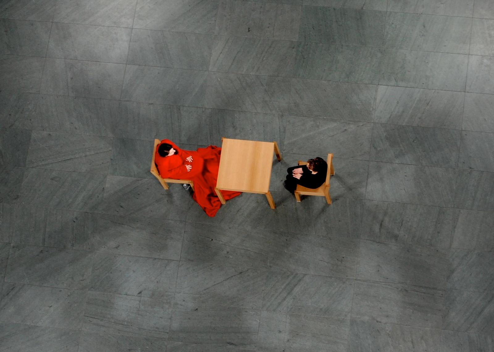 A woman in a red dress sitting opposite another person with a wooden desk between them​​​​‌﻿‍﻿​‍​‍‌‍﻿﻿‌﻿​‍‌‍‍‌‌‍‌﻿‌‍‍‌‌‍﻿‍​‍​‍​﻿‍‍​‍​‍‌﻿​﻿‌‍​‌‌‍﻿‍‌‍‍‌‌﻿‌​‌﻿‍‌​‍﻿‍‌‍‍‌‌‍﻿﻿​‍​‍​‍﻿​​‍​‍‌‍‍​‌﻿​‍‌‍‌‌‌‍‌‍​‍​‍​﻿‍‍​‍​‍‌‍‍​‌﻿‌​‌﻿‌​‌﻿​​​﻿‍‍​‍﻿﻿​‍﻿﻿‌‍﻿​‌‍﻿﻿‌‍​﻿‌‍​‌‌‍﻿​‌‍‍​‌‍﻿﻿‌﻿​﻿‌﻿‌​​﻿‍‍​﻿​﻿​﻿​﻿​﻿​﻿​﻿​﻿​‍﻿﻿‌‍‍‌‌‍﻿‍‌﻿‌​‌‍‌‌‌‍﻿‍‌﻿‌​​‍﻿﻿‌‍‌‌‌‍‌​‌‍‍‌‌﻿‌​​‍﻿﻿‌‍﻿‌‌‍﻿﻿‌‍‌​‌‍‌‌​﻿﻿‌‌﻿​​‌﻿​‍‌‍‌‌‌﻿​﻿‌‍‌‌‌‍﻿‍‌﻿‌​‌‍​‌‌﻿‌​‌‍‍‌‌‍﻿﻿‌‍﻿‍​﻿‍﻿‌‍‍‌‌‍‌​​﻿﻿‌​﻿​‍​﻿‍‌​﻿‍‌​﻿‌﻿​﻿​‌‌‍‌‌‌‍​‌​﻿‍‌​‍﻿‌‌‍​‍‌‍‌‌​﻿​‍​﻿​‍​‍﻿‌​﻿‌​​﻿‌‍​﻿‌​‌‍​‍​‍﻿‌​﻿‍​‌‍‌​​﻿‌‍‌‍​﻿​‍﻿‌‌‍‌‍‌‍‌​​﻿​​‌‍‌​​﻿​​‌‍‌‍​﻿​﻿‌‍‌​‌‍​‍​﻿‌‍​﻿‍​​﻿‌‍​﻿‍﻿‌﻿‌​‌﻿‍‌‌﻿​​‌‍‌‌​﻿﻿‌‌﻿​​‌‍﻿﻿‌﻿​﻿‌﻿‌​​﻿‍﻿‌﻿​​‌‍​‌‌﻿‌​‌‍‍​​﻿﻿‌‌‍﻿‌‌‍​‌‌‍‍‌‌‍﻿‍‌​‍‌‌‍﻿‌‌‍​‌‌‍‌﻿‌‍‌‌​‍﻿‍‌‍​‌‌‍﻿​‌﻿‌​​﻿﻿﻿‌‍​‍‌‍​‌‌﻿​﻿‌‍‌‌‌‌‌‌‌﻿​‍‌‍﻿​​﻿﻿‌‌‍‍​‌﻿‌​‌﻿‌​‌﻿​​​‍‌‌​﻿​﻿‌​​‌​‍‌‌​﻿​‍‌​‌‍​‍‌‌​﻿​‍‌​‌‍‌‍﻿​‌‍﻿﻿‌‍​﻿‌‍​‌‌‍﻿​‌‍‍​‌‍﻿﻿‌﻿​﻿‌﻿‌​​‍‌‌​﻿​﻿‌​​‌​﻿​﻿​﻿​﻿​﻿​﻿​﻿​﻿​‍‌‍‌‍‍‌‌‍‌​​﻿﻿‌​﻿​‍​﻿‍‌​﻿‍‌​﻿‌﻿​﻿​‌‌‍‌‌‌‍​‌​﻿‍‌​‍﻿‌‌‍​‍‌‍‌‌​﻿​‍​﻿​‍​‍﻿‌​﻿‌​​﻿‌‍​﻿‌​‌‍​‍​‍﻿‌​﻿‍​‌‍‌​​﻿‌‍‌‍​﻿​‍﻿‌‌‍‌‍‌‍‌​​﻿​​‌‍‌​​﻿​​‌‍‌‍​﻿​﻿‌‍‌​‌‍​‍​﻿‌‍​﻿‍​​﻿‌‍​‍‌‍‌﻿‌​‌﻿‍‌‌﻿​​‌‍‌‌​﻿﻿‌‌﻿​​‌‍﻿﻿‌﻿​﻿‌﻿‌​​‍‌‍‌﻿​​‌‍​‌‌﻿‌​‌‍‍​​﻿﻿‌‌‍﻿‌‌‍​‌‌‍‍‌‌‍﻿‍‌​‍‌‌‍﻿‌‌‍​‌‌‍‌﻿‌‍‌‌​‍﻿‍‌‍​‌‌‍﻿​‌﻿‌​​‍​‍‌﻿﻿‌