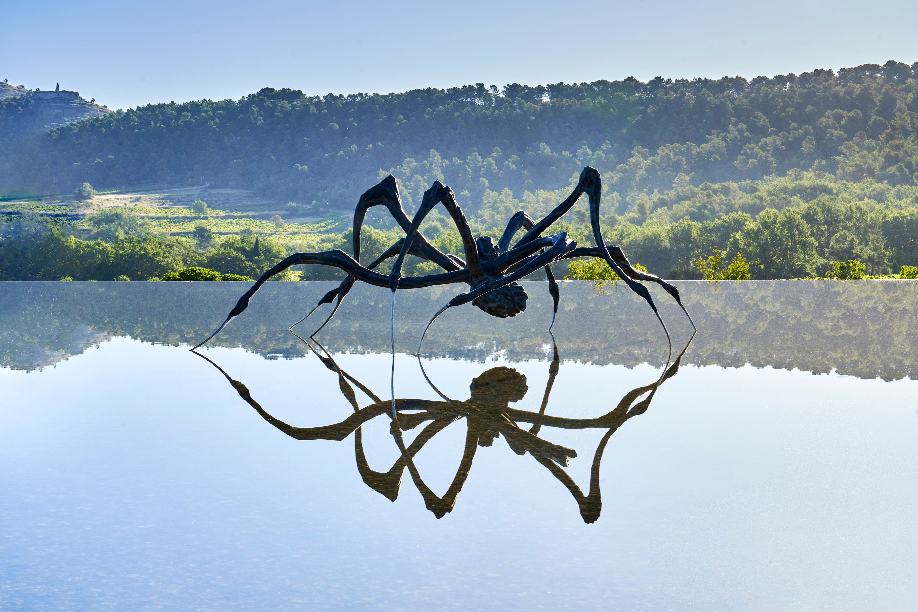 A sculpture of a spider on water with hills in the background  ​​​​‌﻿‍﻿​‍​‍‌‍﻿﻿‌﻿​‍‌‍‍‌‌‍‌﻿‌‍‍‌‌‍﻿‍​‍​‍​﻿‍‍​‍​‍‌﻿​﻿‌‍​‌‌‍﻿‍‌‍‍‌‌﻿‌​‌﻿‍‌​‍﻿‍‌‍‍‌‌‍﻿﻿​‍​‍​‍﻿​​‍​‍‌‍‍​‌﻿​‍‌‍‌‌‌‍‌‍​‍​‍​﻿‍‍​‍​‍‌‍‍​‌﻿‌​‌﻿‌​‌﻿​​​﻿‍‍​‍﻿﻿​‍﻿﻿‌‍﻿​‌‍﻿﻿‌‍​﻿‌‍​‌‌‍﻿​‌‍‍​‌‍﻿﻿‌﻿​﻿‌﻿‌​​﻿‍‍​﻿​﻿​﻿​﻿​﻿​﻿​﻿​﻿​‍﻿﻿‌‍‍‌‌‍﻿‍‌﻿‌​‌‍‌‌‌‍﻿‍‌﻿‌​​‍﻿﻿‌‍‌‌‌‍‌​‌‍‍‌‌﻿‌​​‍﻿﻿‌‍﻿‌‌‍﻿﻿‌‍‌​‌‍‌‌​﻿﻿‌‌﻿​​‌﻿​‍‌‍‌‌‌﻿​﻿‌‍‌‌‌‍﻿‍‌﻿‌​‌‍​‌‌﻿‌​‌‍‍‌‌‍﻿﻿‌‍﻿‍​﻿‍﻿‌‍‍‌‌‍‌​​﻿﻿‌​﻿‌​​﻿​﻿‌‍‌‍​﻿​​‌‍​﻿​﻿​​‌‍​‌‌‍​‌​‍﻿‌​﻿‌‍​﻿‍​​﻿‍​​﻿‌‌​‍﻿‌​﻿‌​‌‍‌‍​﻿‌‌​﻿​﻿​‍﻿‌​﻿‍​​﻿‍​‌‍‌‍​﻿‍​​‍﻿‌‌‍​‌​﻿‍​‌‍‌‍‌‍‌​​﻿​‍‌‍​﻿​﻿‌​​﻿​﻿‌‍‌​​﻿​‌​﻿‍‌‌‍​‌​﻿‍﻿‌﻿‌​‌﻿‍‌‌﻿​​‌‍‌‌​﻿﻿‌‌﻿​​‌‍﻿﻿‌﻿​﻿‌﻿‌​​﻿‍﻿‌﻿​​‌‍​‌‌﻿‌​‌‍‍​​﻿﻿‌‌‍﻿‌‌‍​‌‌‍‍‌‌‍﻿‍‌​‍‌‌‍﻿‌‌‍​‌‌‍‌﻿‌‍‌‌​‍﻿‍‌‍​‌‌‍﻿​‌﻿‌​​﻿﻿﻿‌‍​‍‌‍​‌‌﻿​﻿‌‍‌‌‌‌‌‌‌﻿​‍‌‍﻿​​﻿﻿‌‌‍‍​‌﻿‌​‌﻿‌​‌﻿​​​‍‌‌​﻿​﻿‌​​‌​‍‌‌​﻿​‍‌​‌‍​‍‌‌​﻿​‍‌​‌‍‌‍﻿​‌‍﻿﻿‌‍​﻿‌‍​‌‌‍﻿​‌‍‍​‌‍﻿﻿‌﻿​﻿‌﻿‌​​‍‌‌​﻿​﻿‌​​‌​﻿​﻿​﻿​﻿​﻿​﻿​﻿​﻿​‍‌‍‌‍‍‌‌‍‌​​﻿﻿‌​﻿‌​​﻿​﻿‌‍‌‍​﻿​​‌‍​﻿​﻿​​‌‍​‌‌‍​‌​‍﻿‌​﻿‌‍​﻿‍​​﻿‍​​﻿‌‌​‍﻿‌​﻿‌​‌‍‌‍​﻿‌‌​﻿​﻿​‍﻿‌​﻿‍​​﻿‍​‌‍‌‍​﻿‍​​‍﻿‌‌‍​‌​﻿‍​‌‍‌‍‌‍‌​​﻿​‍‌‍​﻿​﻿‌​​﻿​﻿‌‍‌​​﻿​‌​﻿‍‌‌‍​‌​‍‌‍‌﻿‌​‌﻿‍‌‌﻿​​‌‍‌‌​﻿﻿‌‌﻿​​‌‍﻿﻿‌﻿​﻿‌﻿‌​​‍‌‍‌﻿​​‌‍​‌‌﻿‌​‌‍‍​​﻿﻿‌‌‍﻿‌‌‍​‌‌‍‍‌‌‍﻿‍‌​‍‌‌‍﻿‌‌‍​‌‌‍‌﻿‌‍‌‌​‍﻿‍‌‍​‌‌‍﻿​‌﻿‌​​‍​‍‌﻿﻿‌