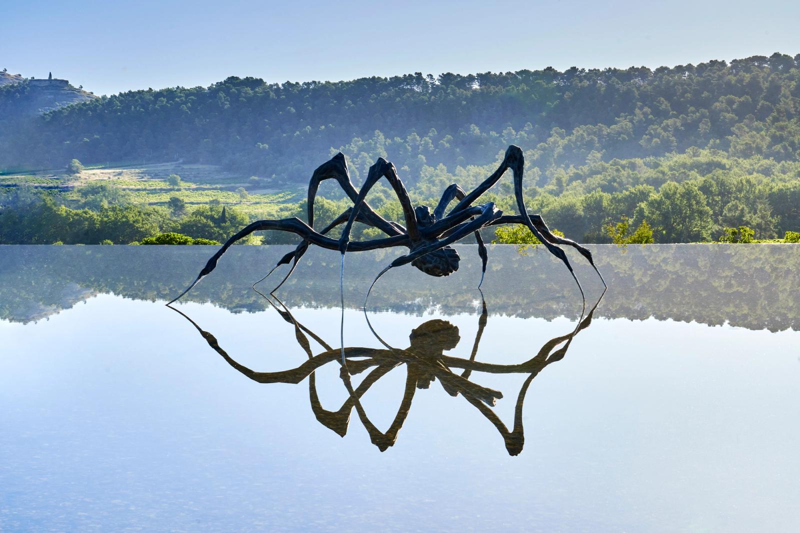 A sculpture of a spider on water with hills in the background  ​​​​‌﻿‍﻿​‍​‍‌‍﻿﻿‌﻿​‍‌‍‍‌‌‍‌﻿‌‍‍‌‌‍﻿‍​‍​‍​﻿‍‍​‍​‍‌﻿​﻿‌‍​‌‌‍﻿‍‌‍‍‌‌﻿‌​‌﻿‍‌​‍﻿‍‌‍‍‌‌‍﻿﻿​‍​‍​‍﻿​​‍​‍‌‍‍​‌﻿​‍‌‍‌‌‌‍‌‍​‍​‍​﻿‍‍​‍​‍‌‍‍​‌﻿‌​‌﻿‌​‌﻿​​​﻿‍‍​‍﻿﻿​‍﻿﻿‌‍﻿​‌‍﻿﻿‌‍​﻿‌‍​‌‌‍﻿​‌‍‍​‌‍﻿﻿‌﻿​﻿‌﻿‌​​﻿‍‍​﻿​﻿​﻿​﻿​﻿​﻿​﻿​﻿​‍﻿﻿‌‍‍‌‌‍﻿‍‌﻿‌​‌‍‌‌‌‍﻿‍‌﻿‌​​‍﻿﻿‌‍‌‌‌‍‌​‌‍‍‌‌﻿‌​​‍﻿﻿‌‍﻿‌‌‍﻿﻿‌‍‌​‌‍‌‌​﻿﻿‌‌﻿​​‌﻿​‍‌‍‌‌‌﻿​﻿‌‍‌‌‌‍﻿‍‌﻿‌​‌‍​‌‌﻿‌​‌‍‍‌‌‍﻿﻿‌‍﻿‍​﻿‍﻿‌‍‍‌‌‍‌​​﻿﻿‌​﻿‌​​﻿​﻿‌‍‌‍​﻿​​‌‍​﻿​﻿​​‌‍​‌‌‍​‌​‍﻿‌​﻿‌‍​﻿‍​​﻿‍​​﻿‌‌​‍﻿‌​﻿‌​‌‍‌‍​﻿‌‌​﻿​﻿​‍﻿‌​﻿‍​​﻿‍​‌‍‌‍​﻿‍​​‍﻿‌‌‍​‌​﻿‍​‌‍‌‍‌‍‌​​﻿​‍‌‍​﻿​﻿‌​​﻿​﻿‌‍‌​​﻿​‌​﻿‍‌‌‍​‌​﻿‍﻿‌﻿‌​‌﻿‍‌‌﻿​​‌‍‌‌​﻿﻿‌‌﻿​​‌‍﻿﻿‌﻿​﻿‌﻿‌​​﻿‍﻿‌﻿​​‌‍​‌‌﻿‌​‌‍‍​​﻿﻿‌‌‍﻿‌‌‍​‌‌‍‍‌‌‍﻿‍‌​‍‌‌‍﻿‌‌‍​‌‌‍‌﻿‌‍‌‌​‍﻿‍‌‍​‌‌‍﻿​‌﻿‌​​﻿﻿﻿‌‍​‍‌‍​‌‌﻿​﻿‌‍‌‌‌‌‌‌‌﻿​‍‌‍﻿​​﻿﻿‌‌‍‍​‌﻿‌​‌﻿‌​‌﻿​​​‍‌‌​﻿​﻿‌​​‌​‍‌‌​﻿​‍‌​‌‍​‍‌‌​﻿​‍‌​‌‍‌‍﻿​‌‍﻿﻿‌‍​﻿‌‍​‌‌‍﻿​‌‍‍​‌‍﻿﻿‌﻿​﻿‌﻿‌​​‍‌‌​﻿​﻿‌​​‌​﻿​﻿​﻿​﻿​﻿​﻿​﻿​﻿​‍‌‍‌‍‍‌‌‍‌​​﻿﻿‌​﻿‌​​﻿​﻿‌‍‌‍​﻿​​‌‍​﻿​﻿​​‌‍​‌‌‍​‌​‍﻿‌​﻿‌‍​﻿‍​​﻿‍​​﻿‌‌​‍﻿‌​﻿‌​‌‍‌‍​﻿‌‌​﻿​﻿​‍﻿‌​﻿‍​​﻿‍​‌‍‌‍​﻿‍​​‍﻿‌‌‍​‌​﻿‍​‌‍‌‍‌‍‌​​﻿​‍‌‍​﻿​﻿‌​​﻿​﻿‌‍‌​​﻿​‌​﻿‍‌‌‍​‌​‍‌‍‌﻿‌​‌﻿‍‌‌﻿​​‌‍‌‌​﻿﻿‌‌﻿​​‌‍﻿﻿‌﻿​﻿‌﻿‌​​‍‌‍‌﻿​​‌‍​‌‌﻿‌​‌‍‍​​﻿﻿‌‌‍﻿‌‌‍​‌‌‍‍‌‌‍﻿‍‌​‍‌‌‍﻿‌‌‍​‌‌‍‌﻿‌‍‌‌​‍﻿‍‌‍​‌‌‍﻿​‌﻿‌​​‍​‍‌﻿﻿‌