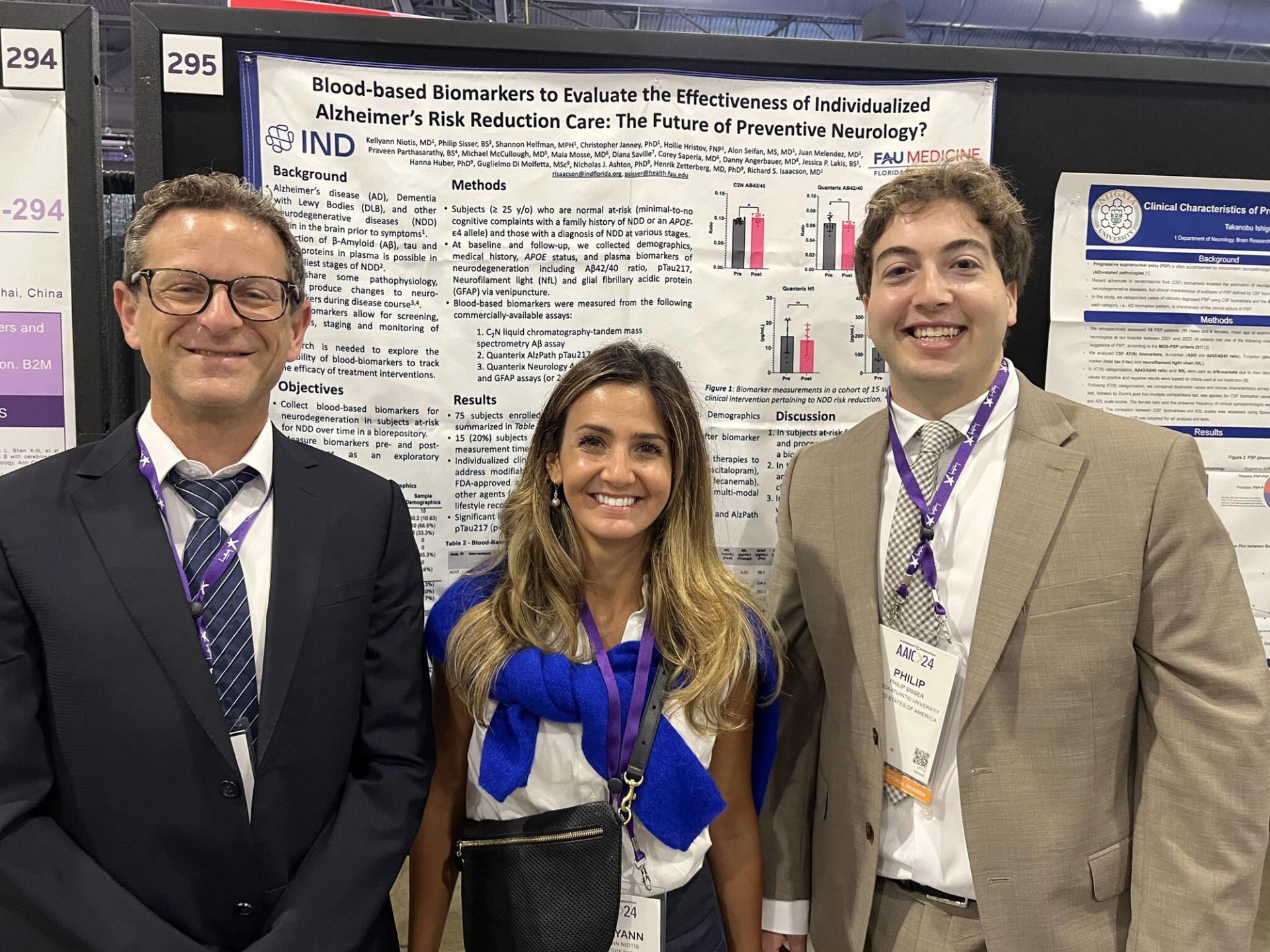 IND team with AAIC poster