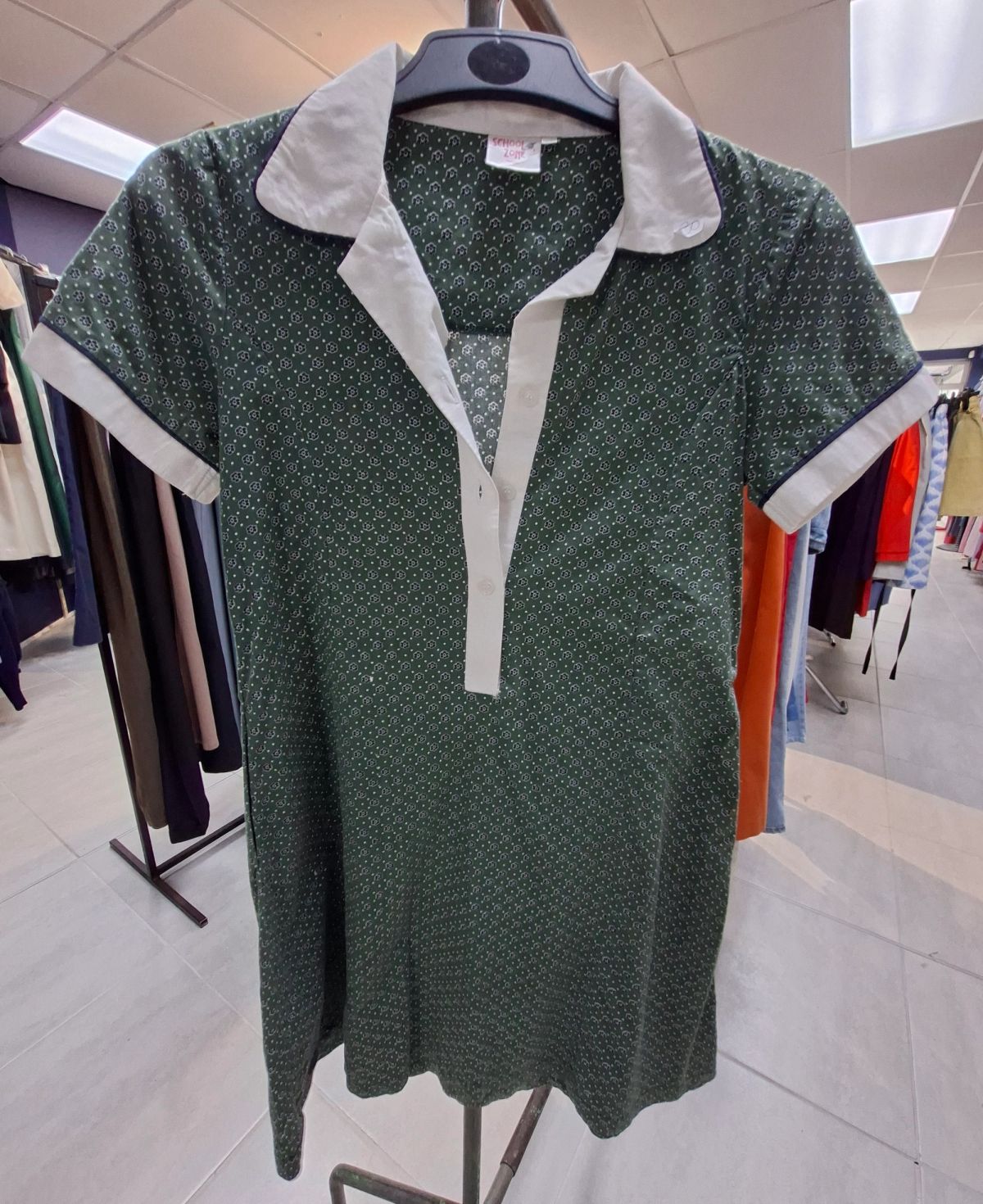 Various sizes and styles of girls’ school uniforms 7