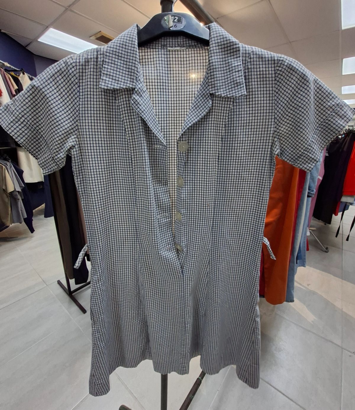 Various sizes and styles of girls’ school uniforms 6