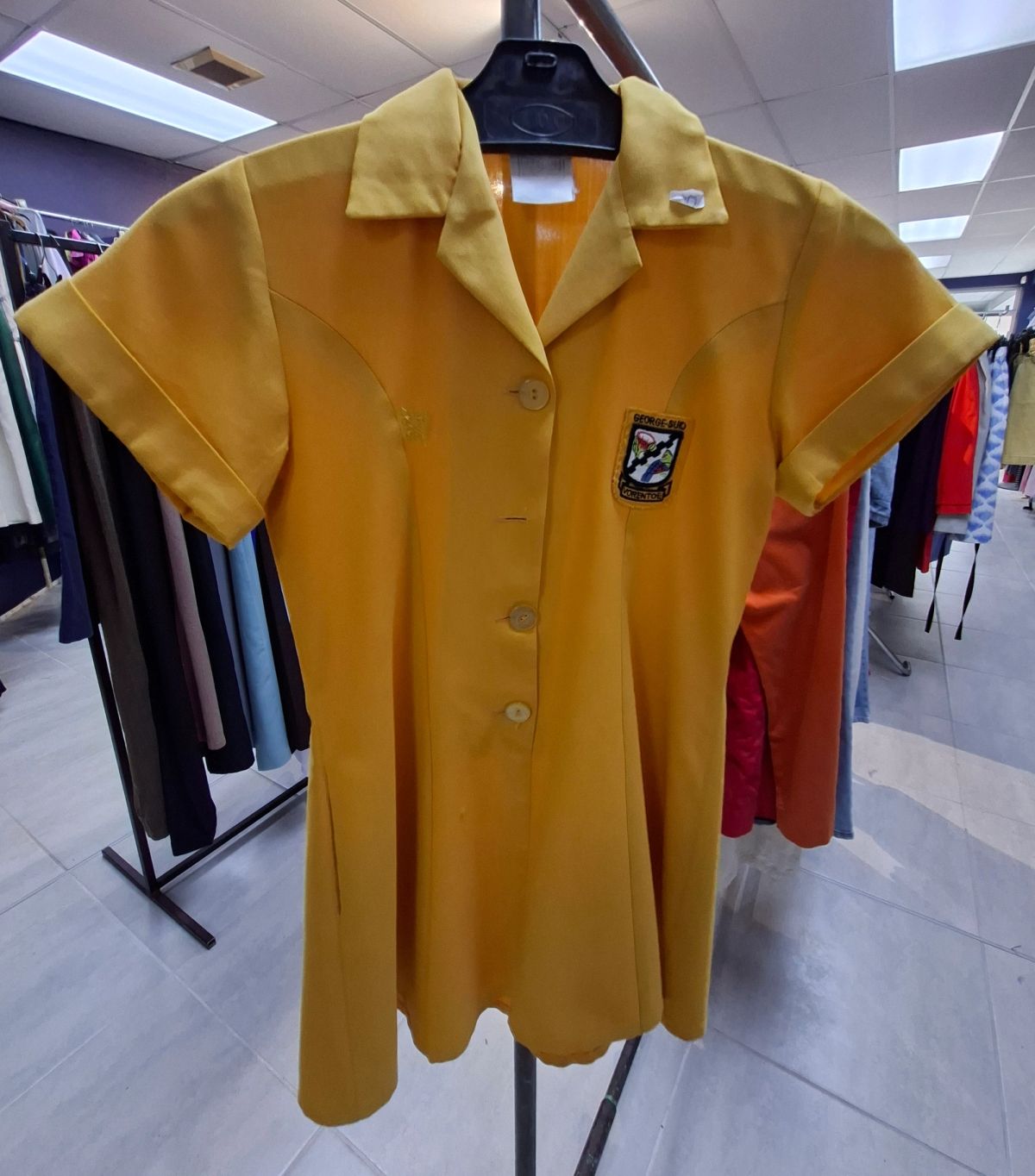 Various sizes and styles of girls’ school uniforms 3